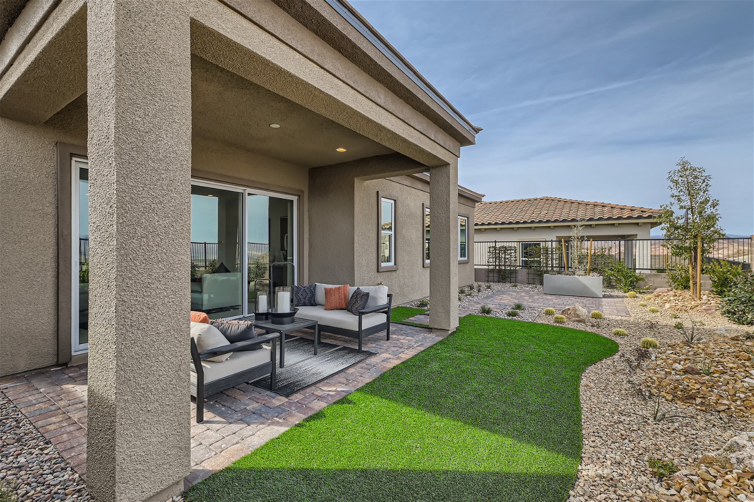 A house with a large front yard.