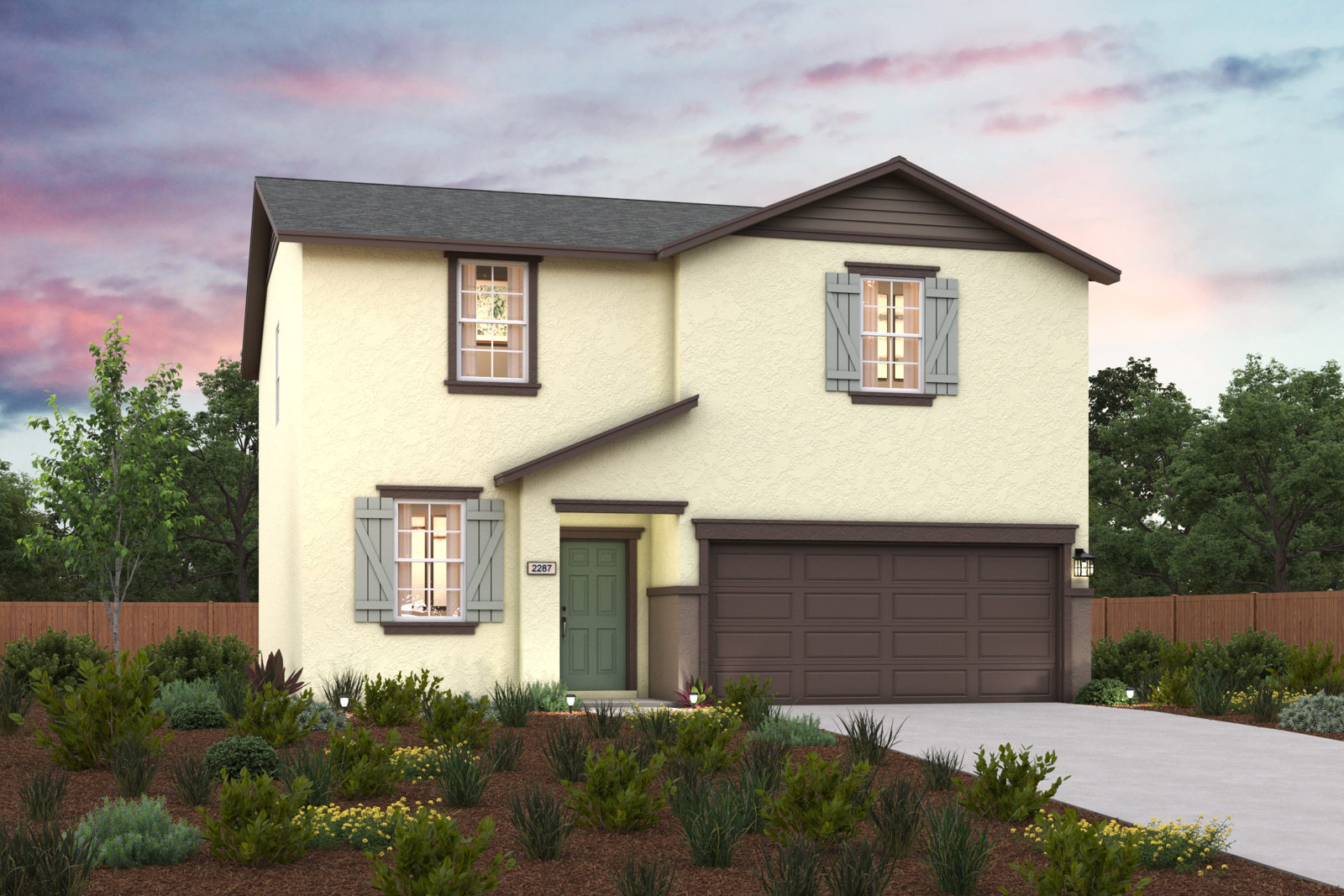 A house with a garage and a fence around it.