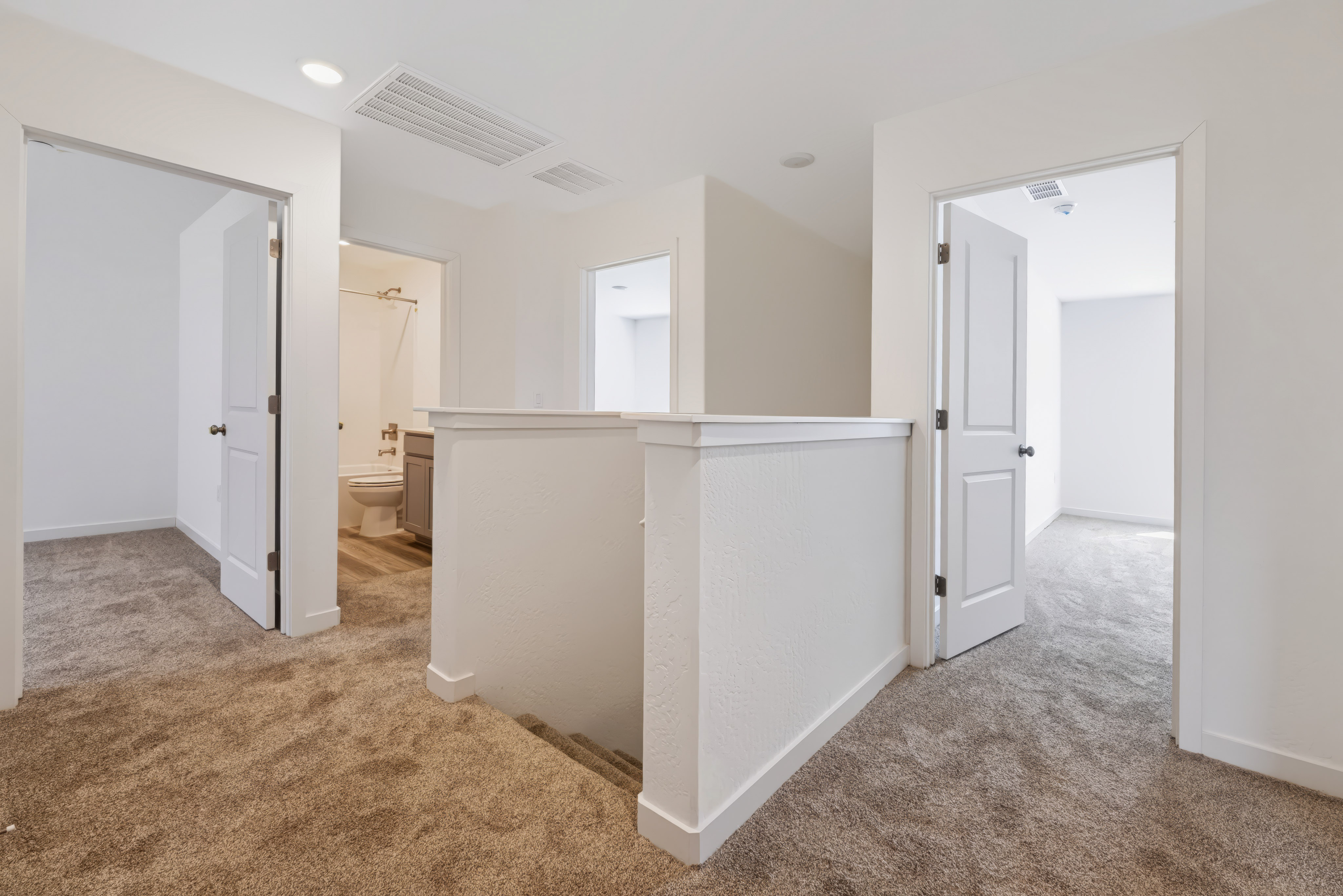 A room with white cabinets.