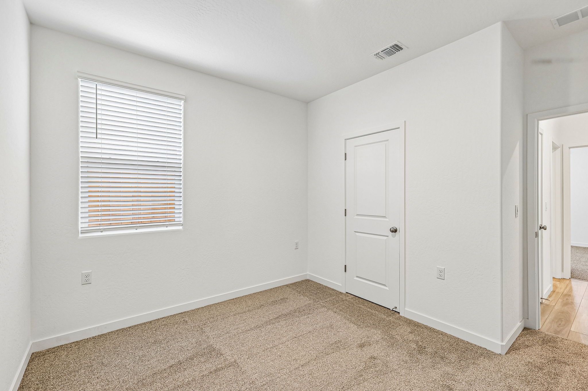 A room with white doors.
