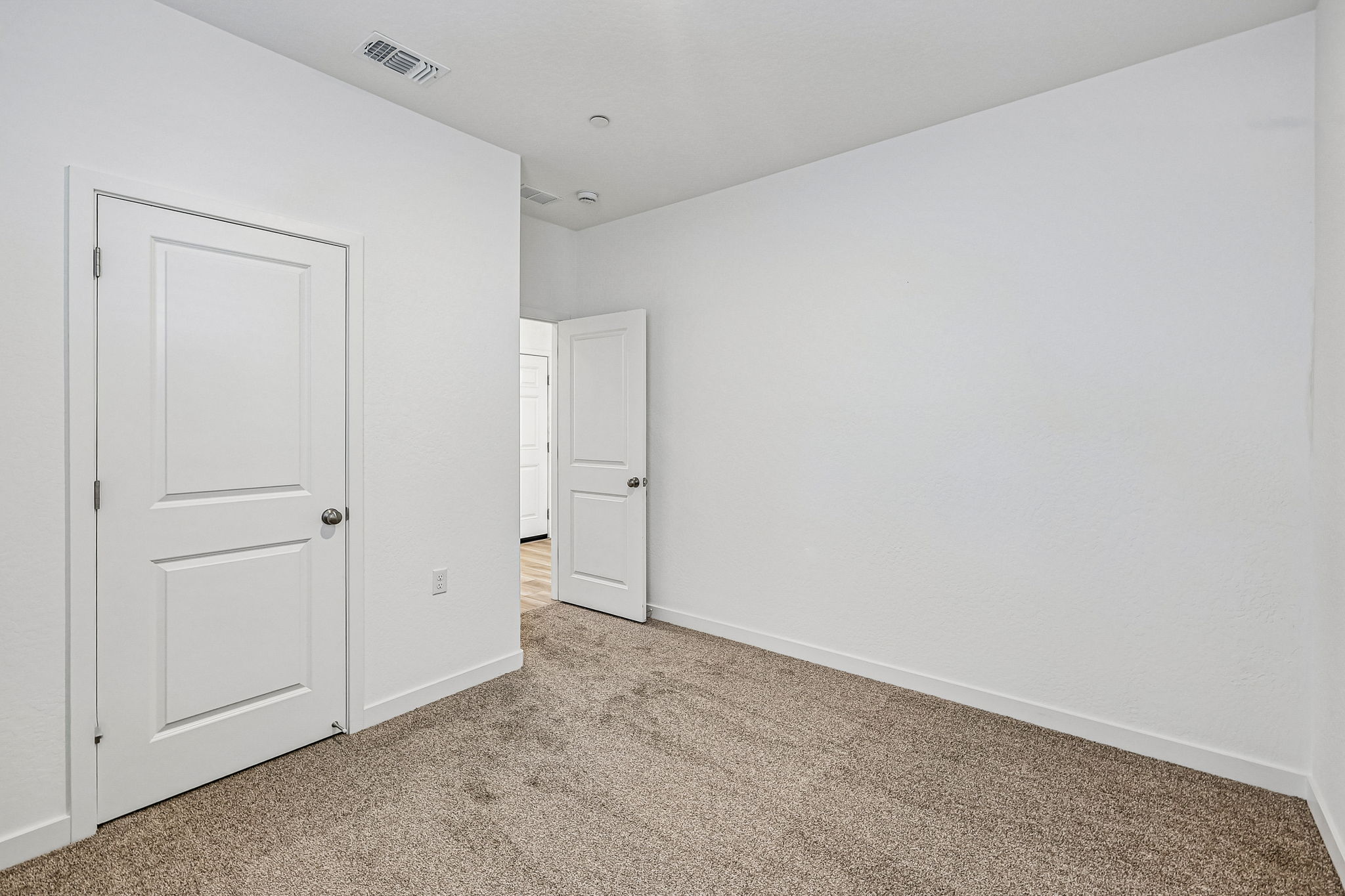 A room with white doors.