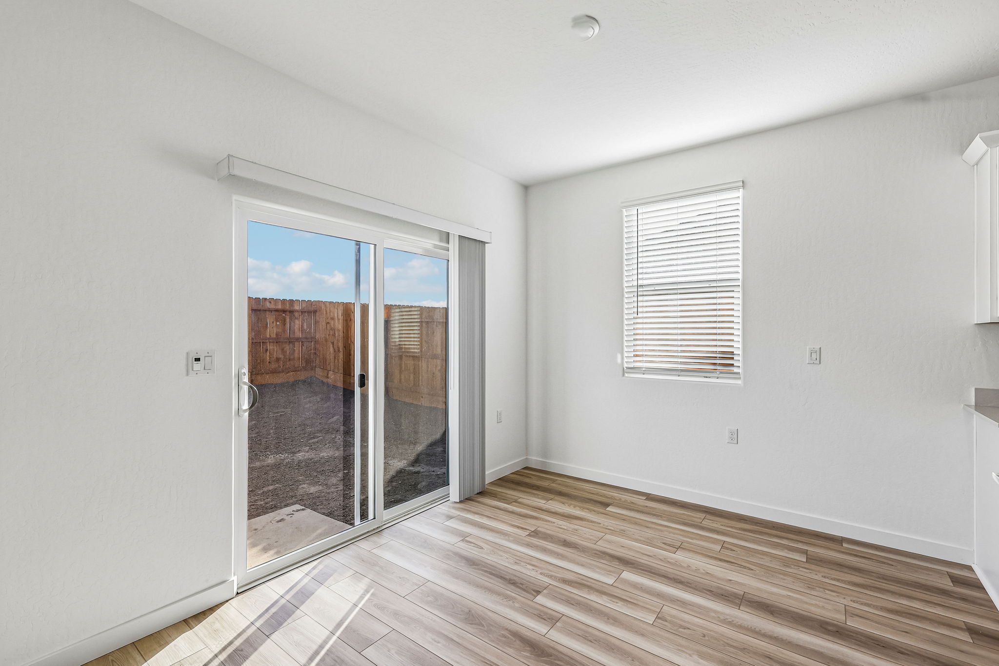 A room with a wood floor and a wood floor.
