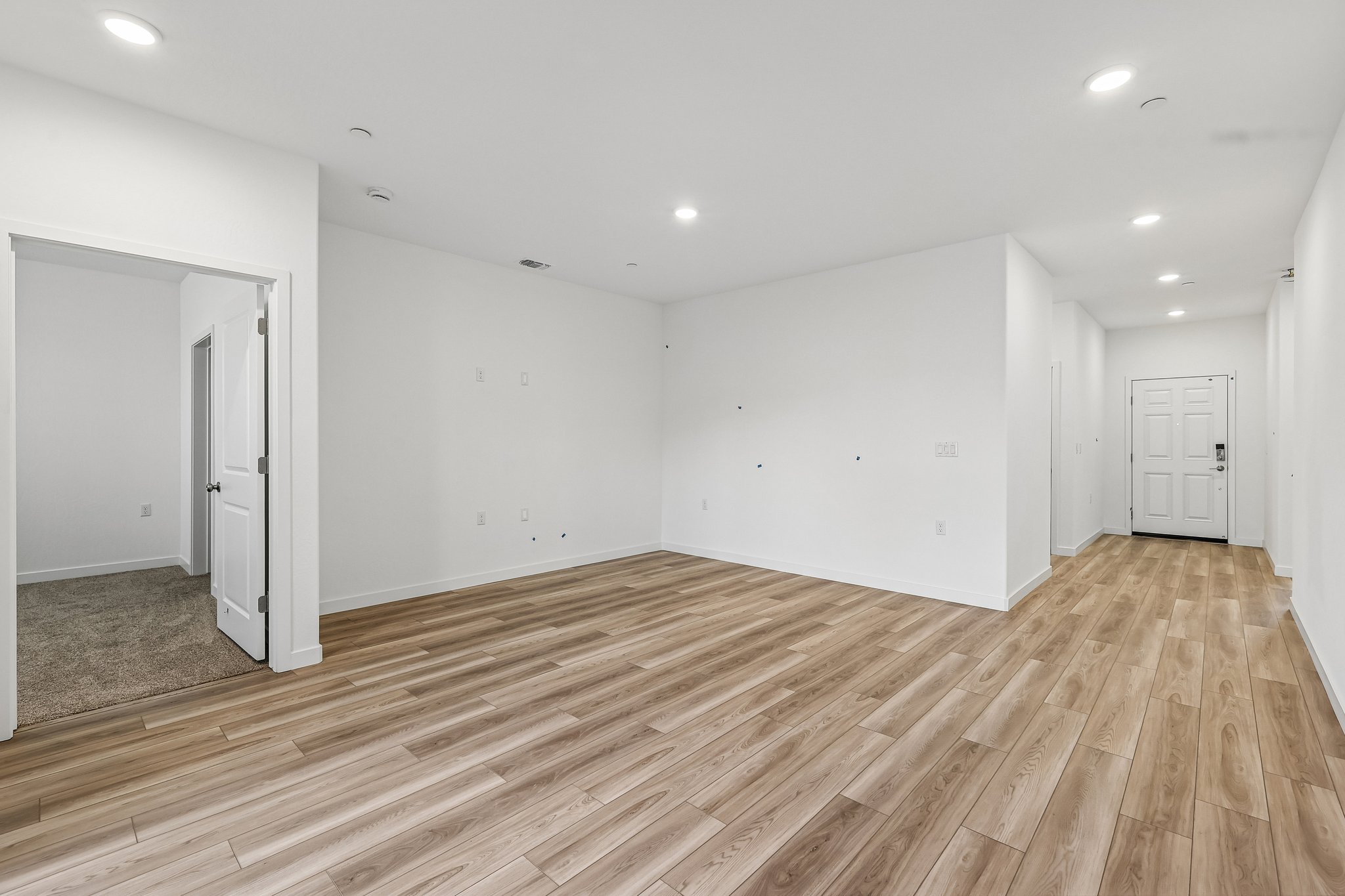 A room with wood floors.