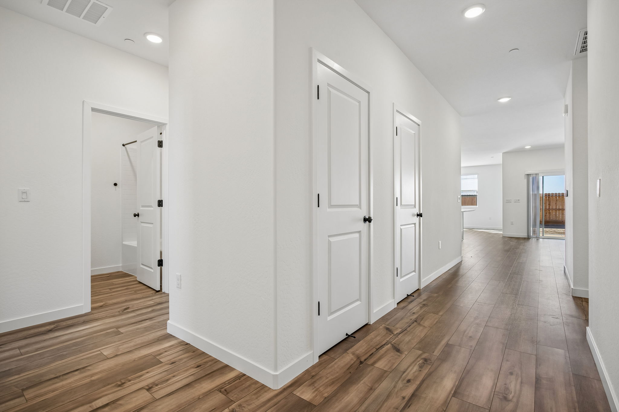 A room with white doors.