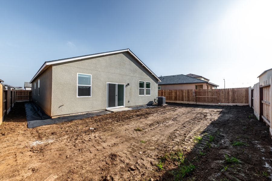 A house with a fence around it.