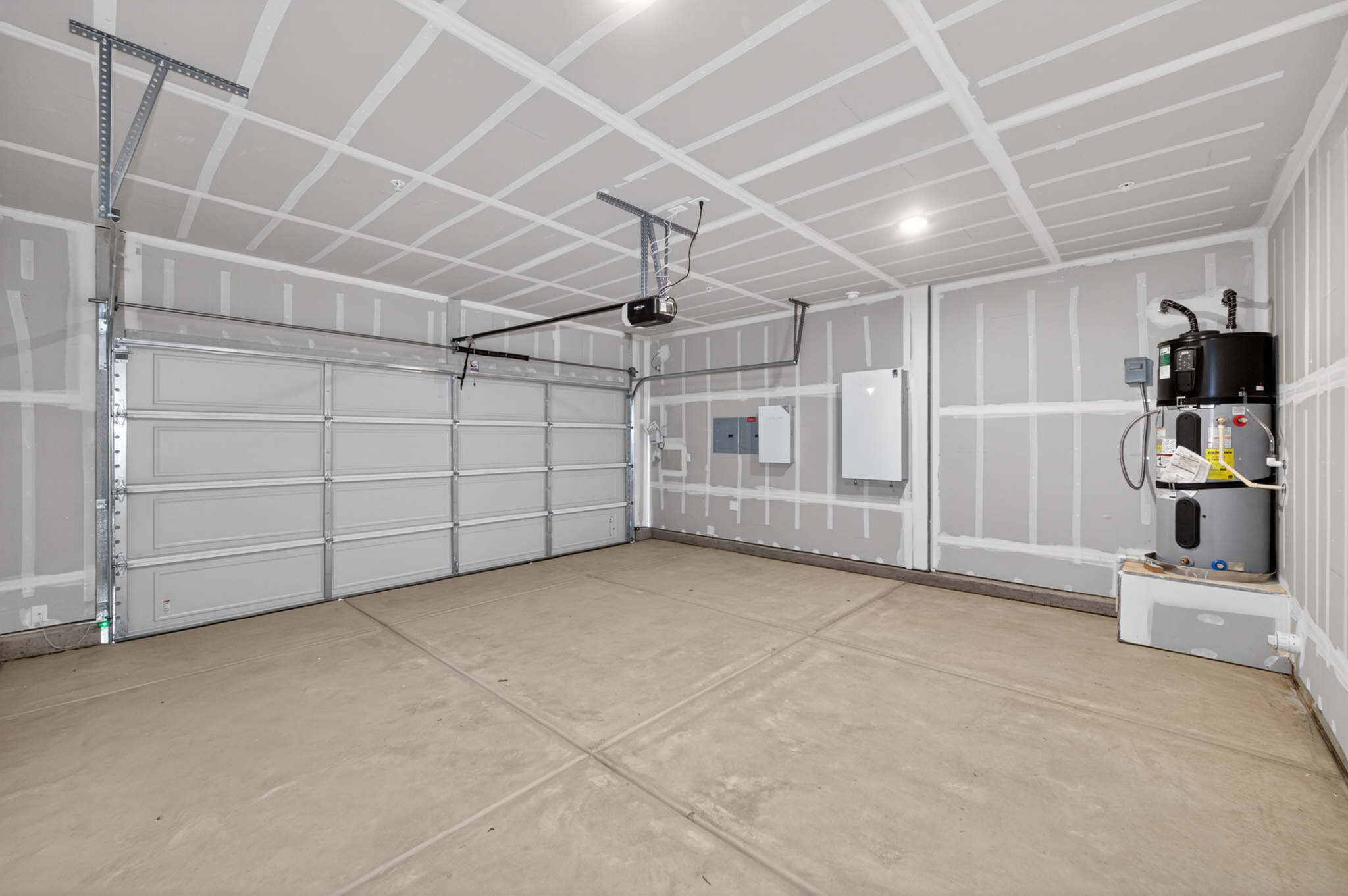 A room with white walls and a wood floor.