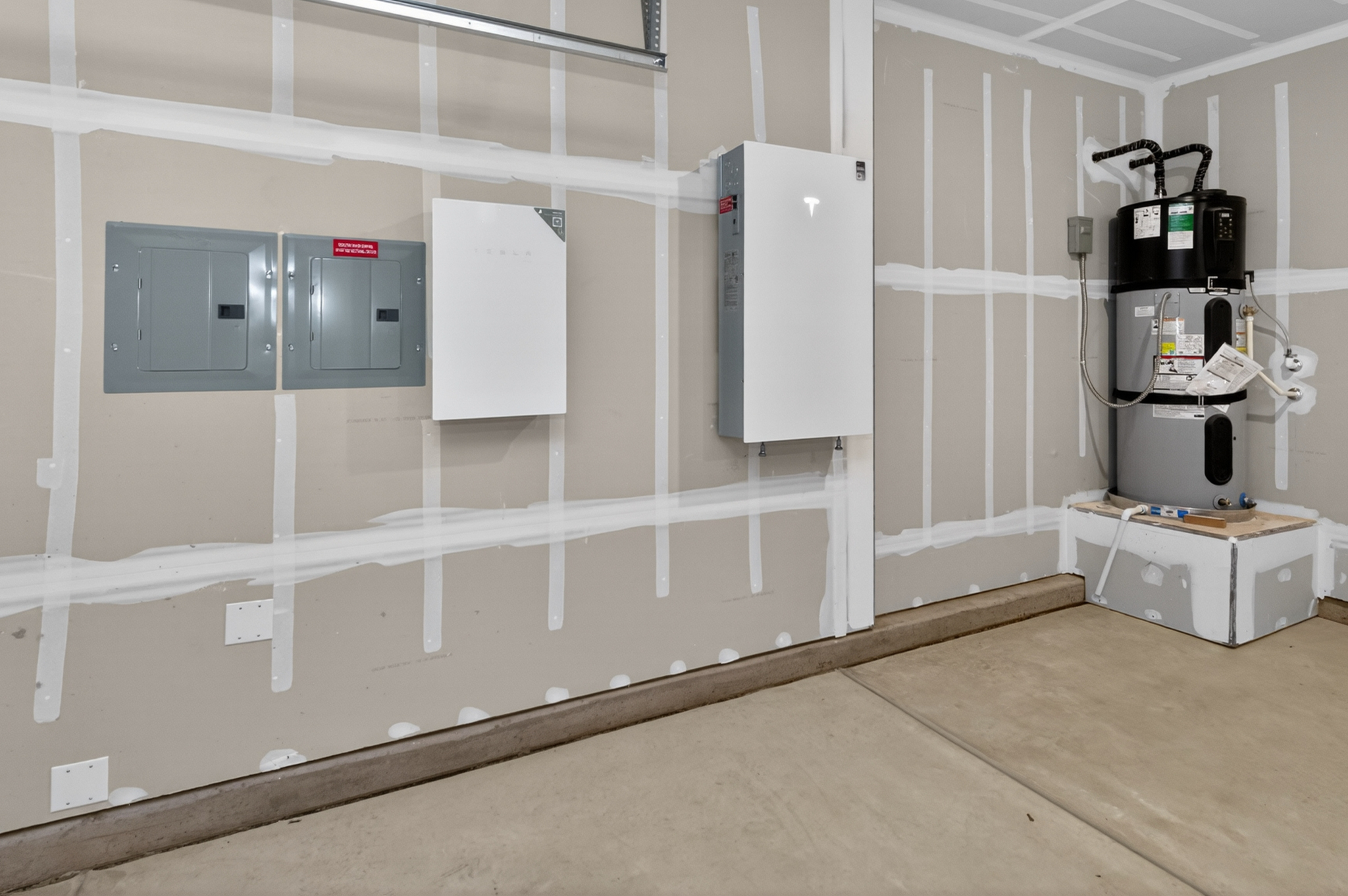 A room with white walls and a white counter with a machine on it.