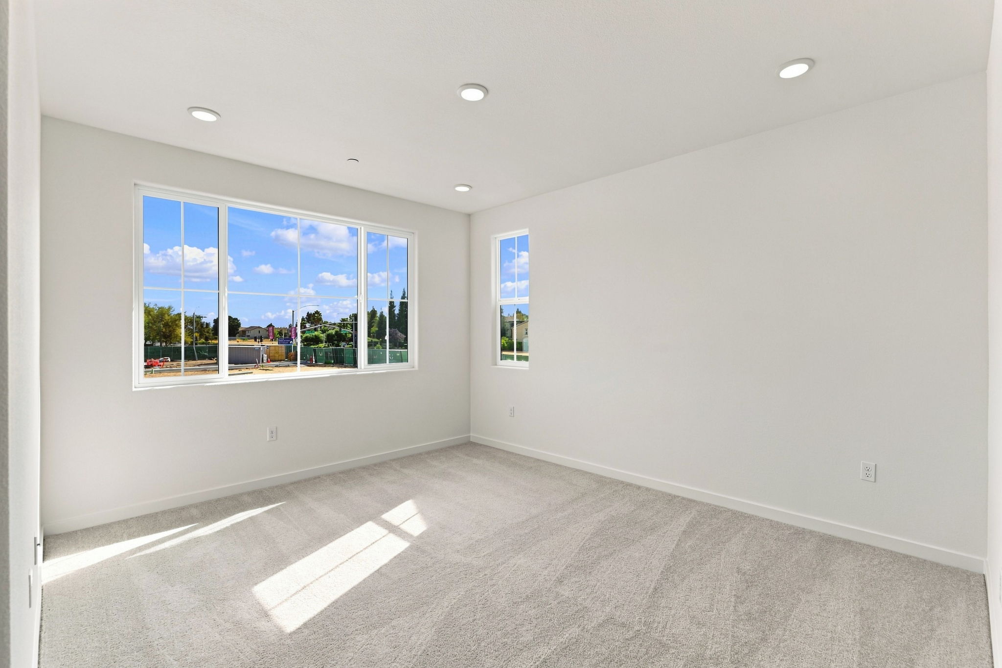 A room with a large window.
