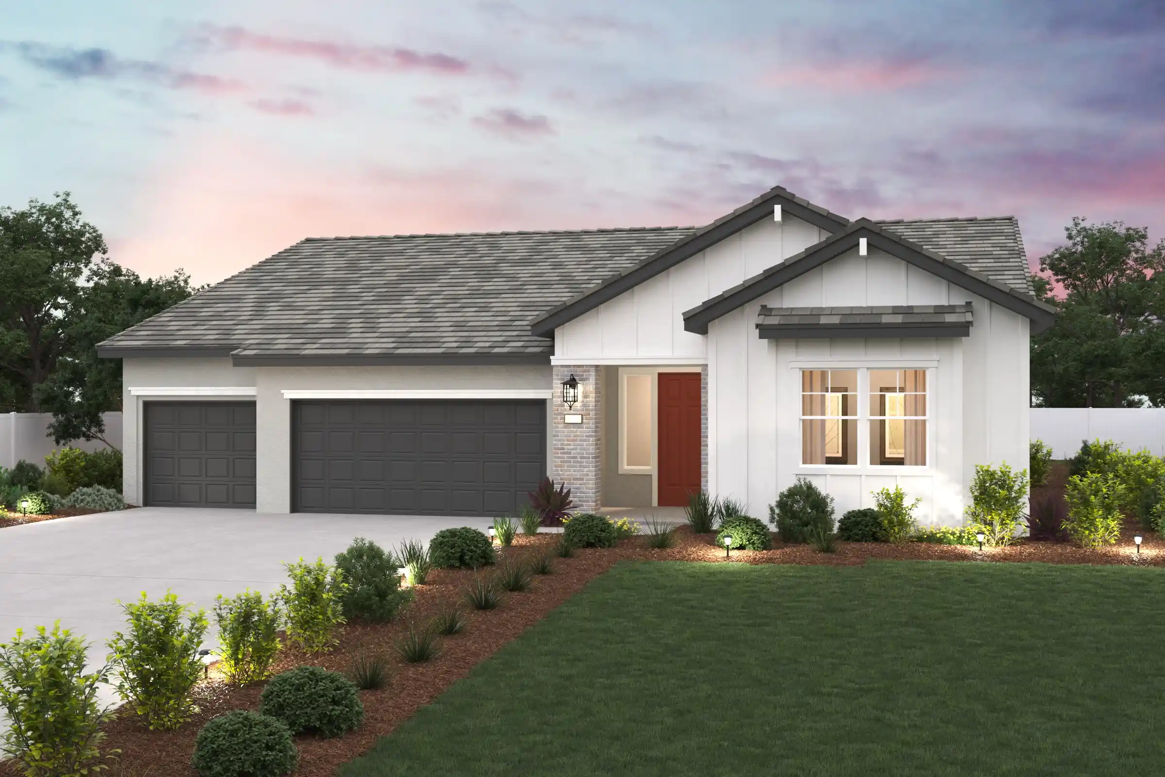 A house with a lawn and a driveway.