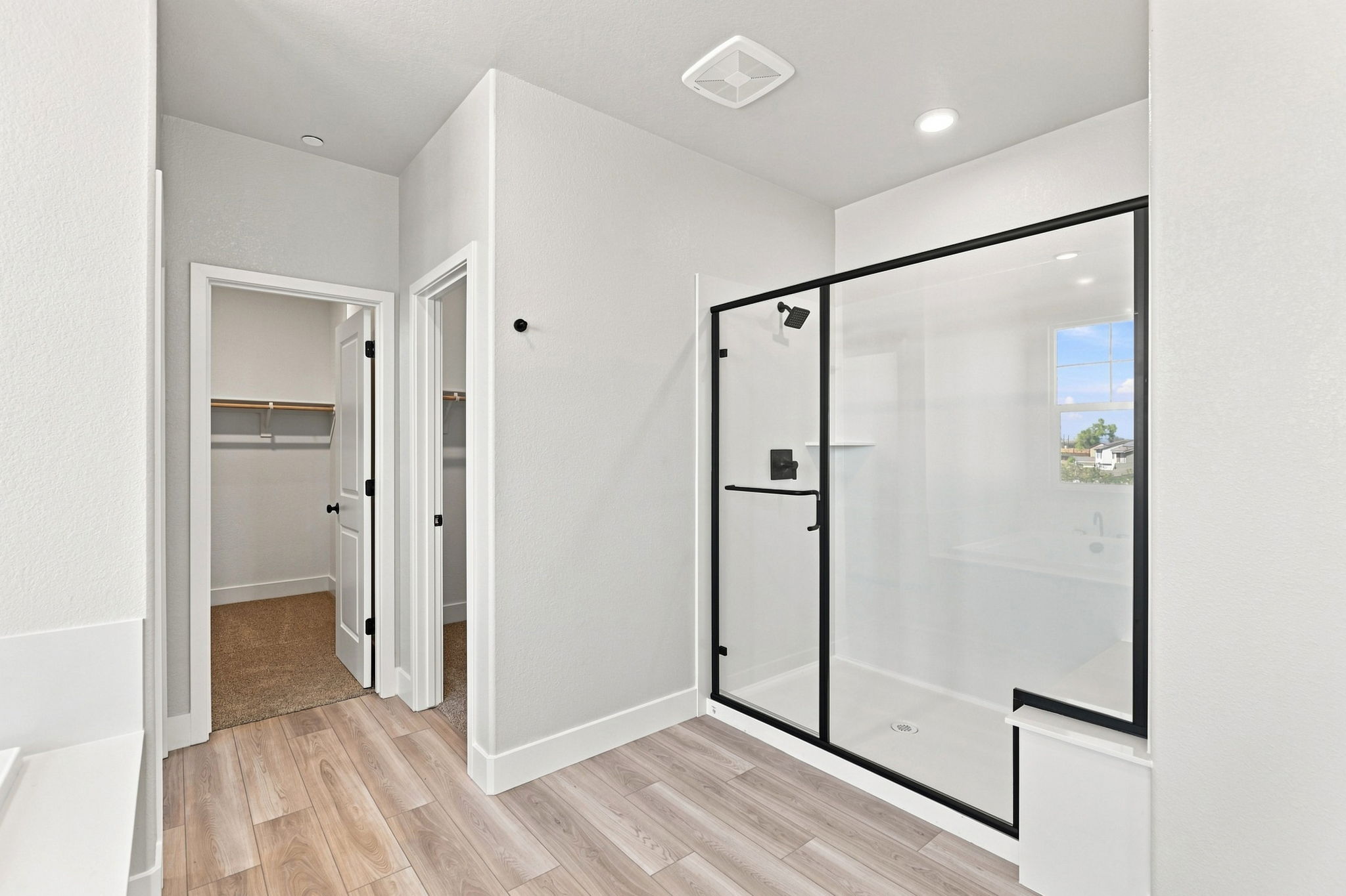 A room with a glass door.
