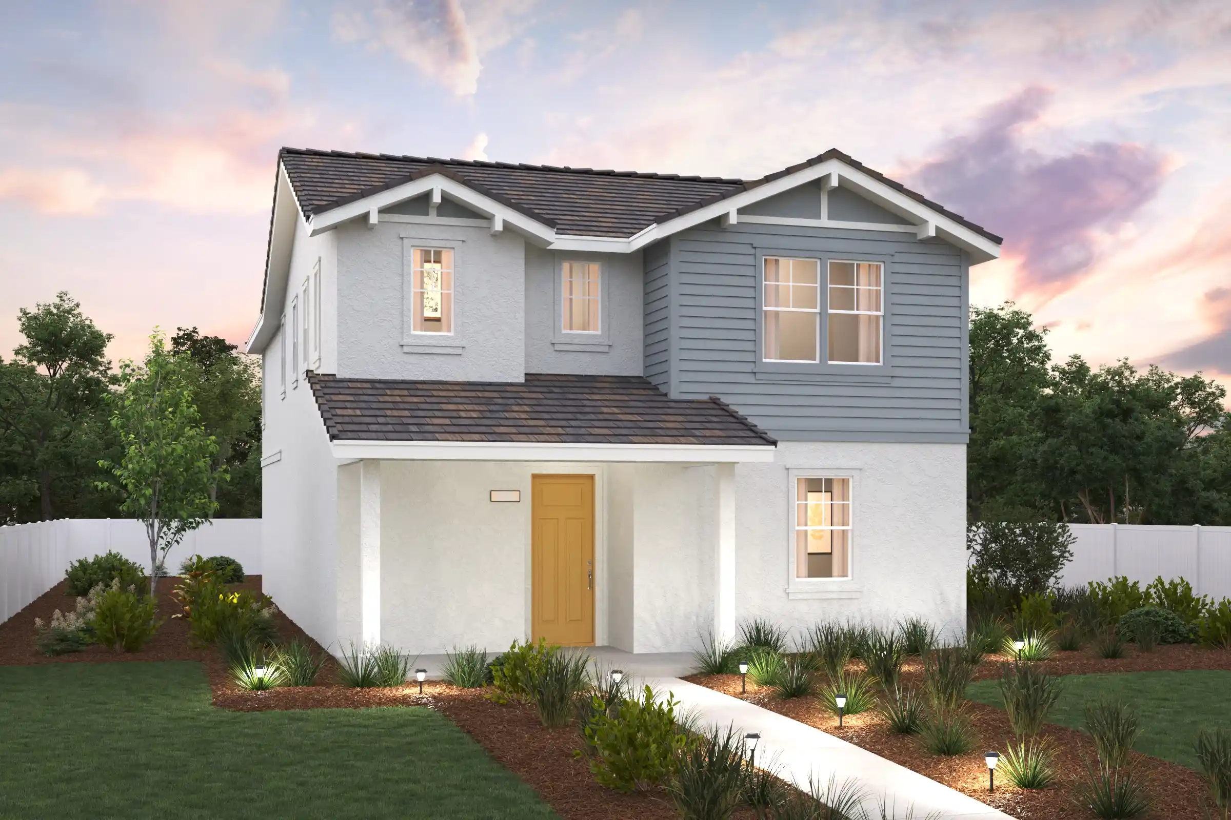 A white house with a driveway.