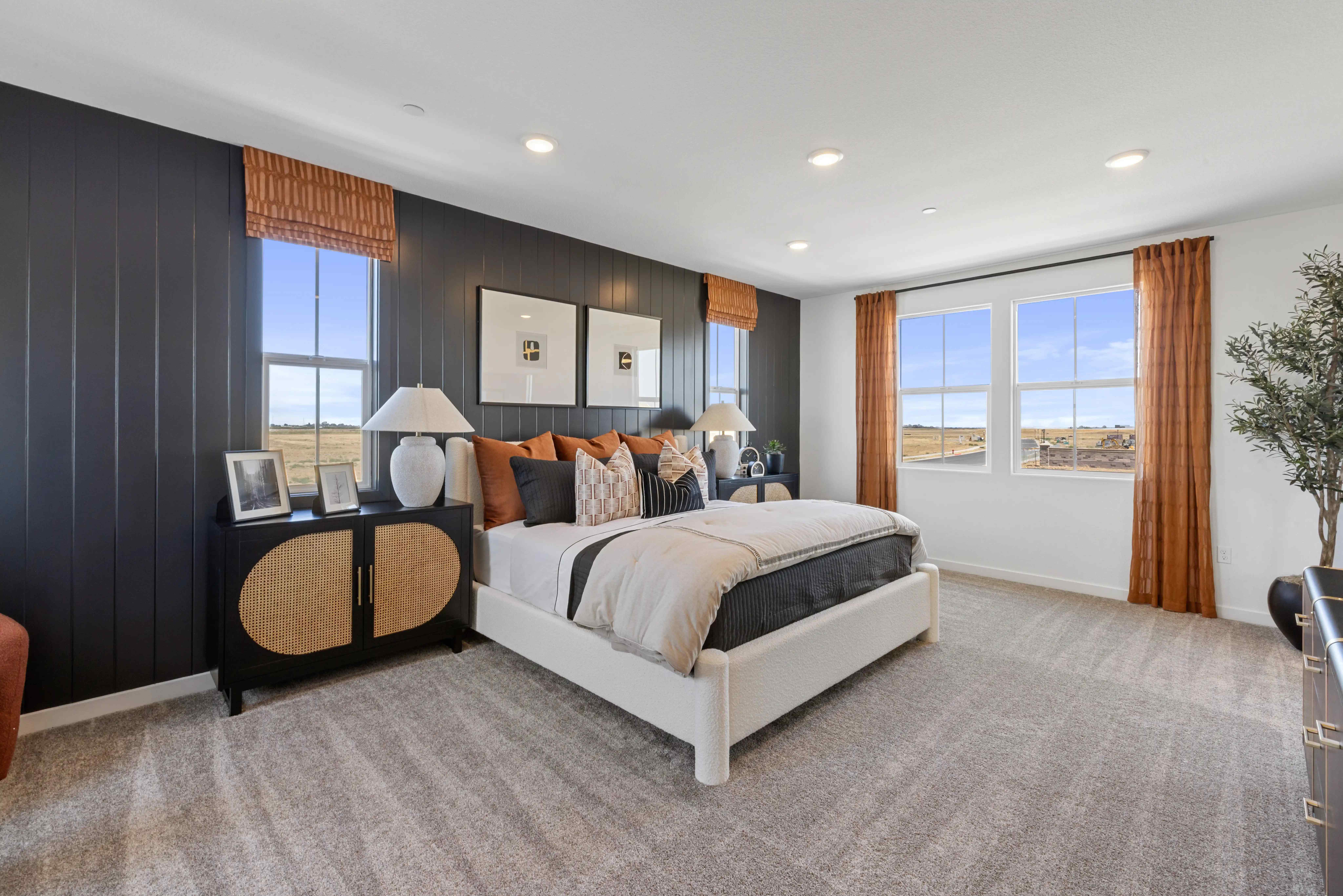 A bedroom with a large bed.