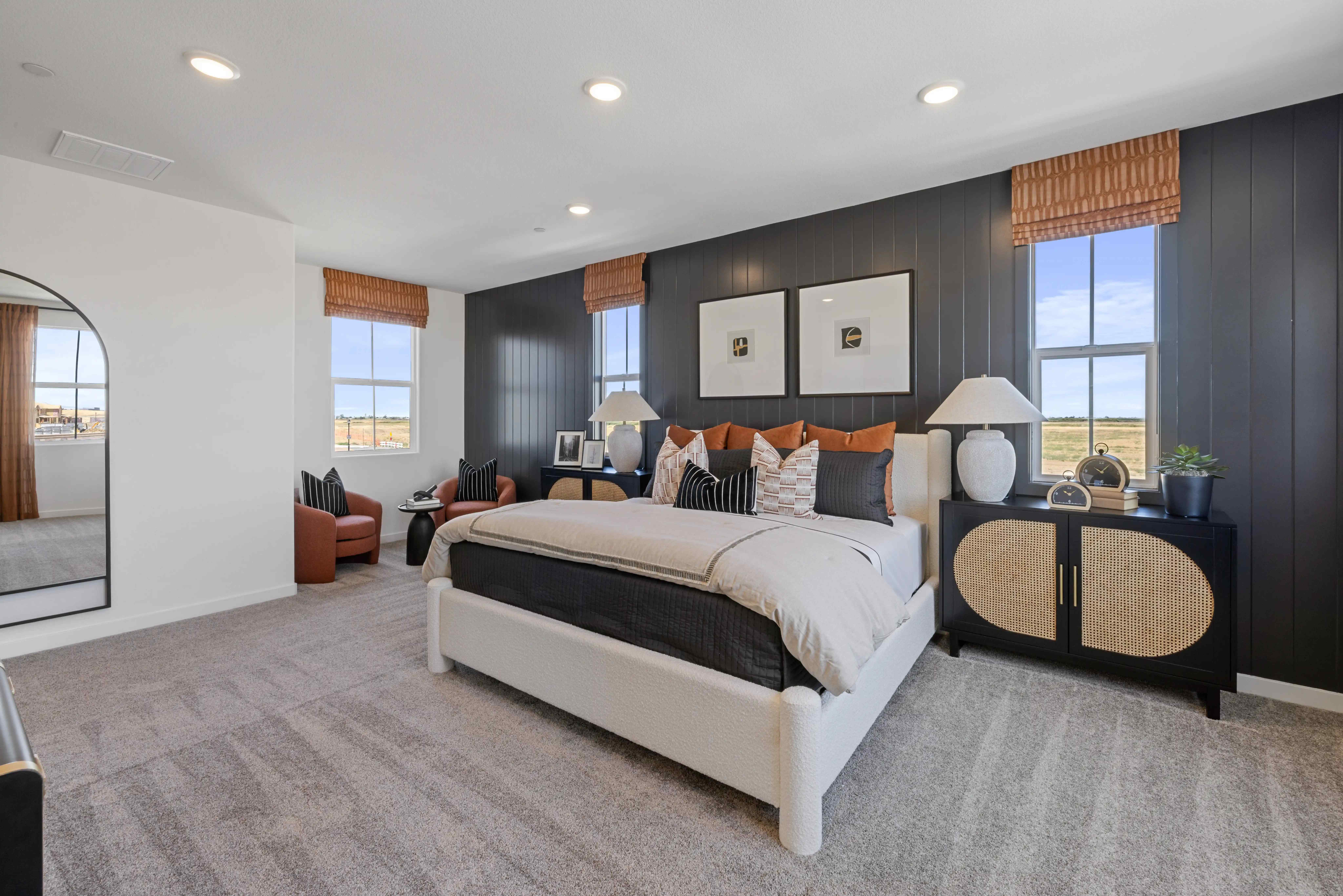 A bedroom with a large bed.