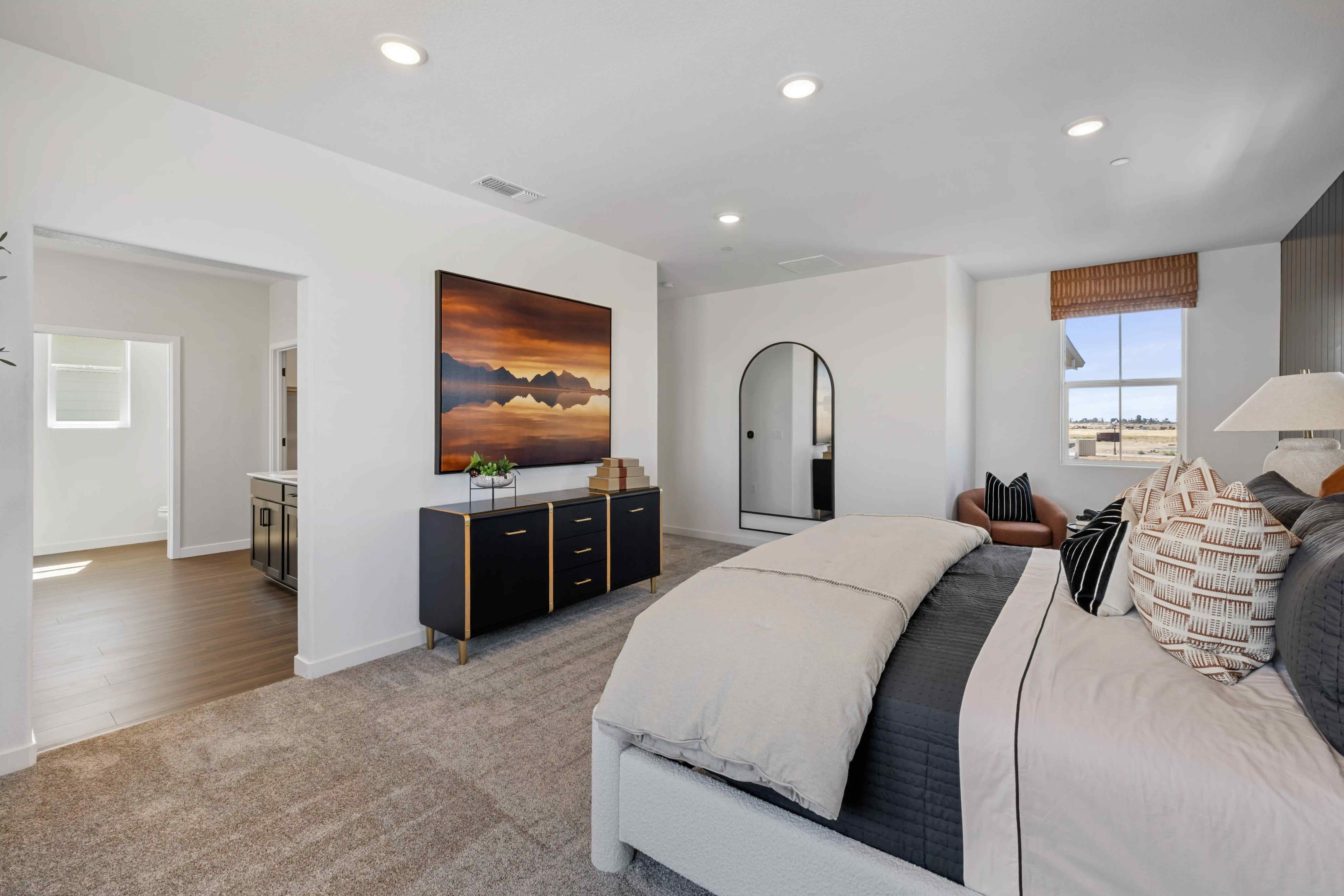 A living room with a large bed.