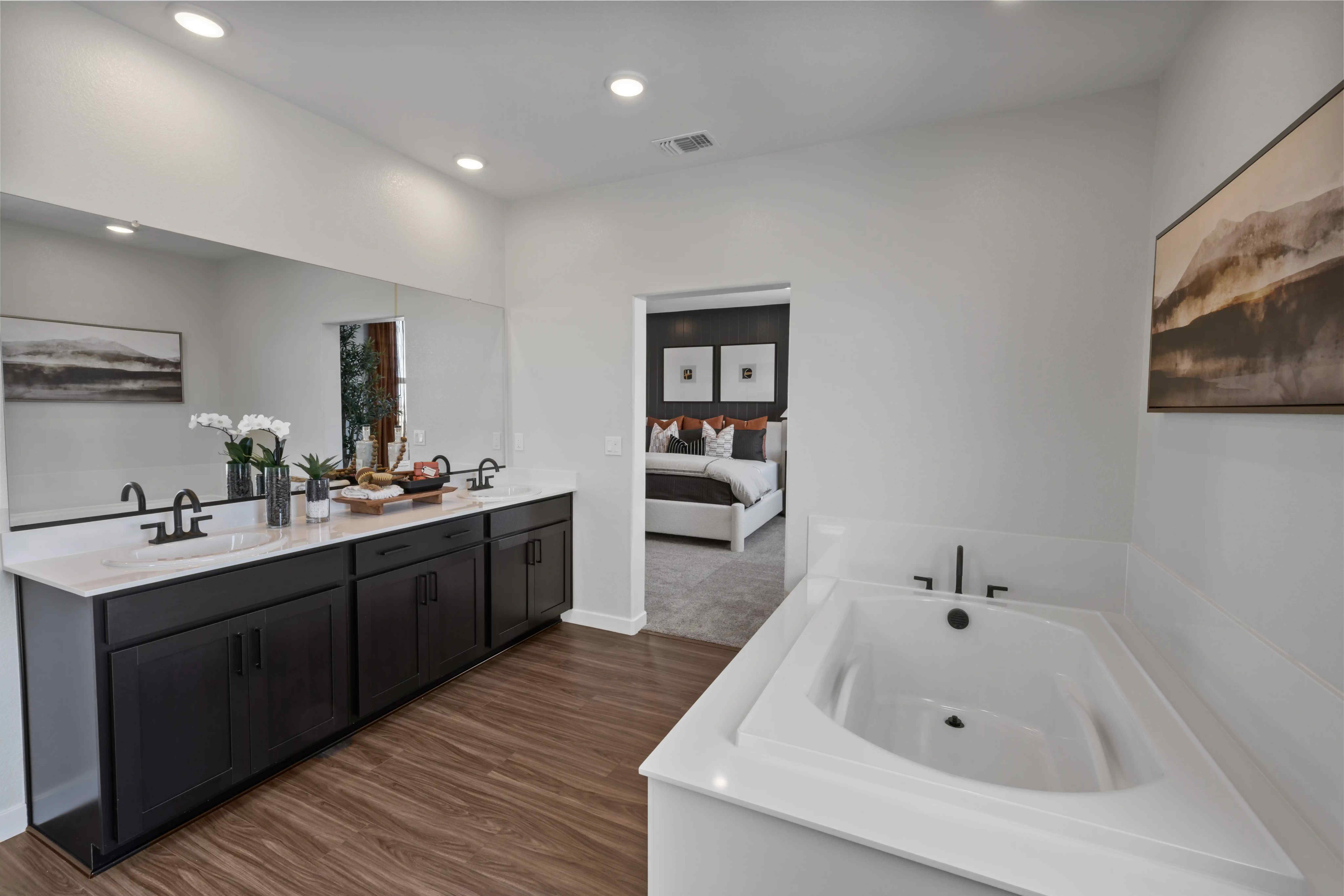 A bathroom with a tub and a sink.