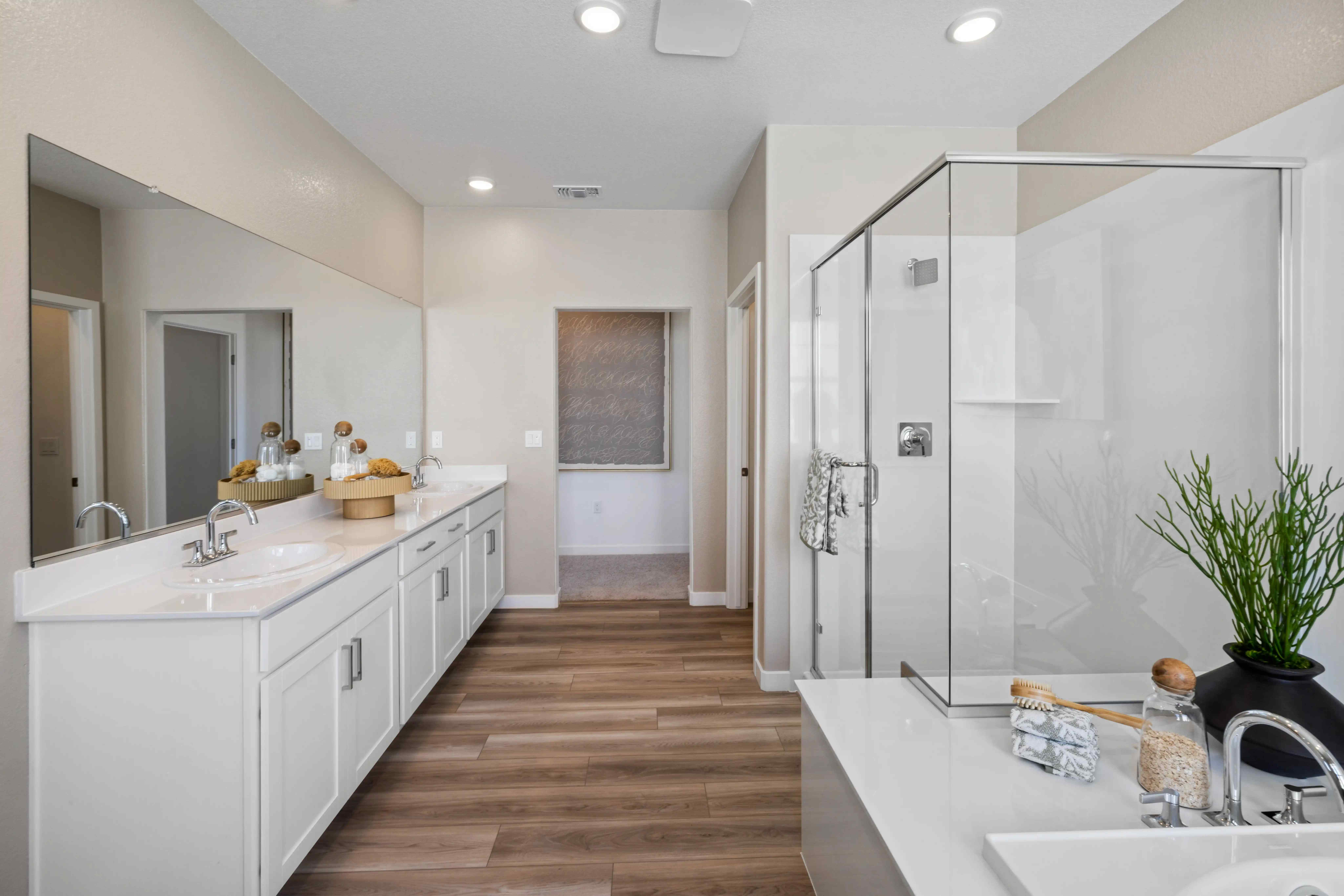 A bathroom with a glass shower.