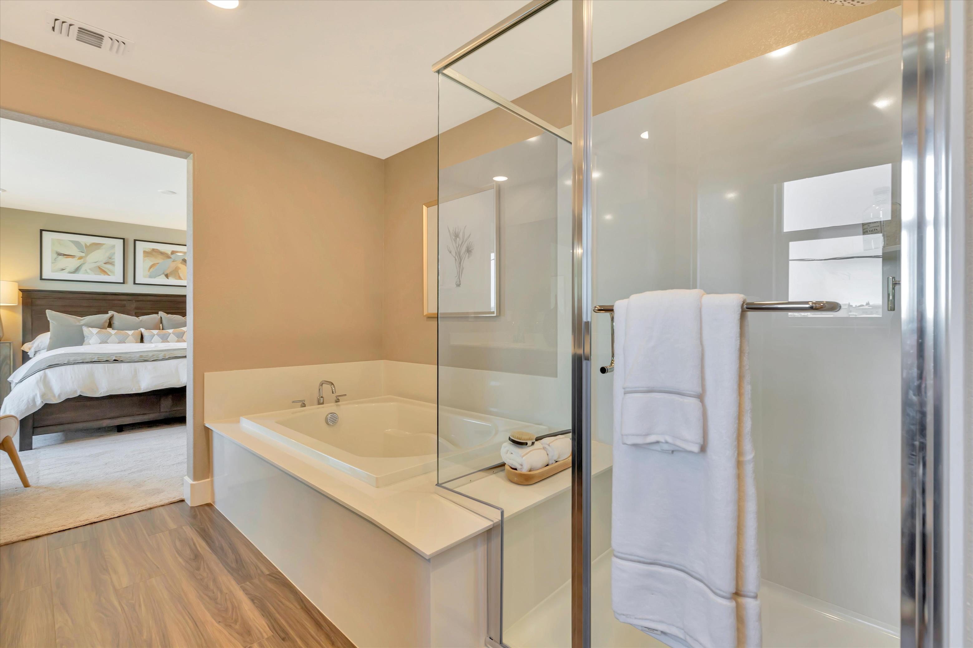 A bathroom with a glass shower.