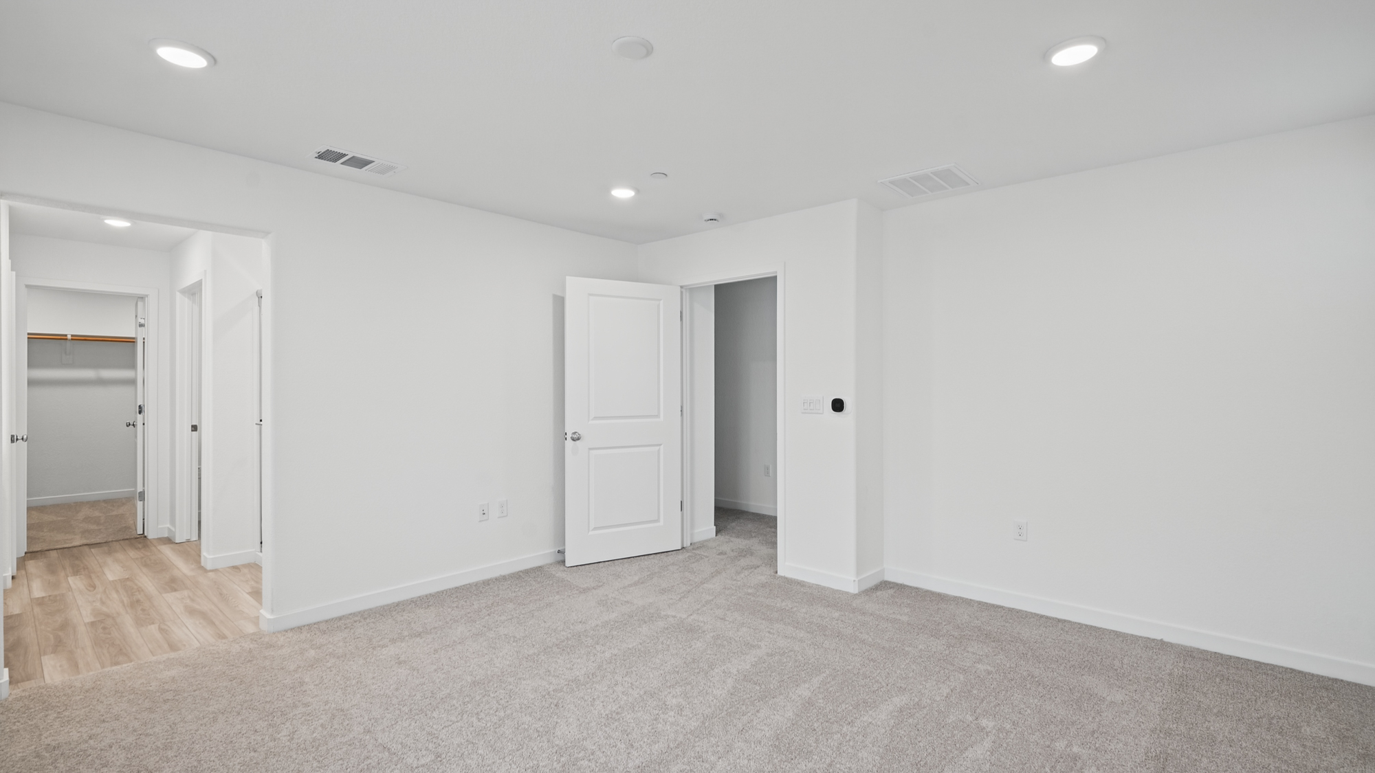 A room with white doors.