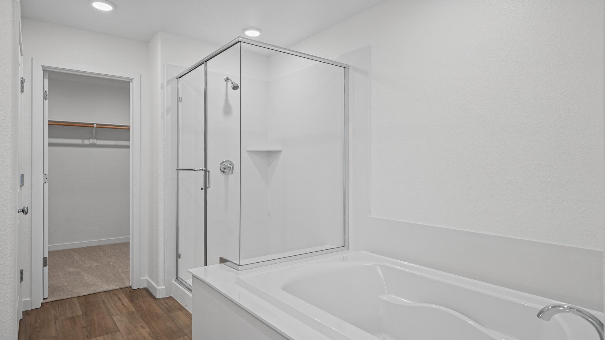 A bathroom with a glass shower.