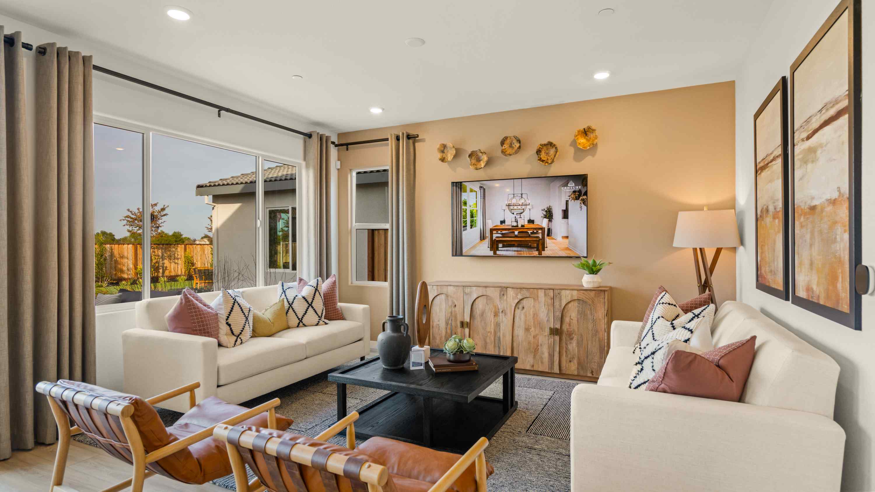A living room with a large window.