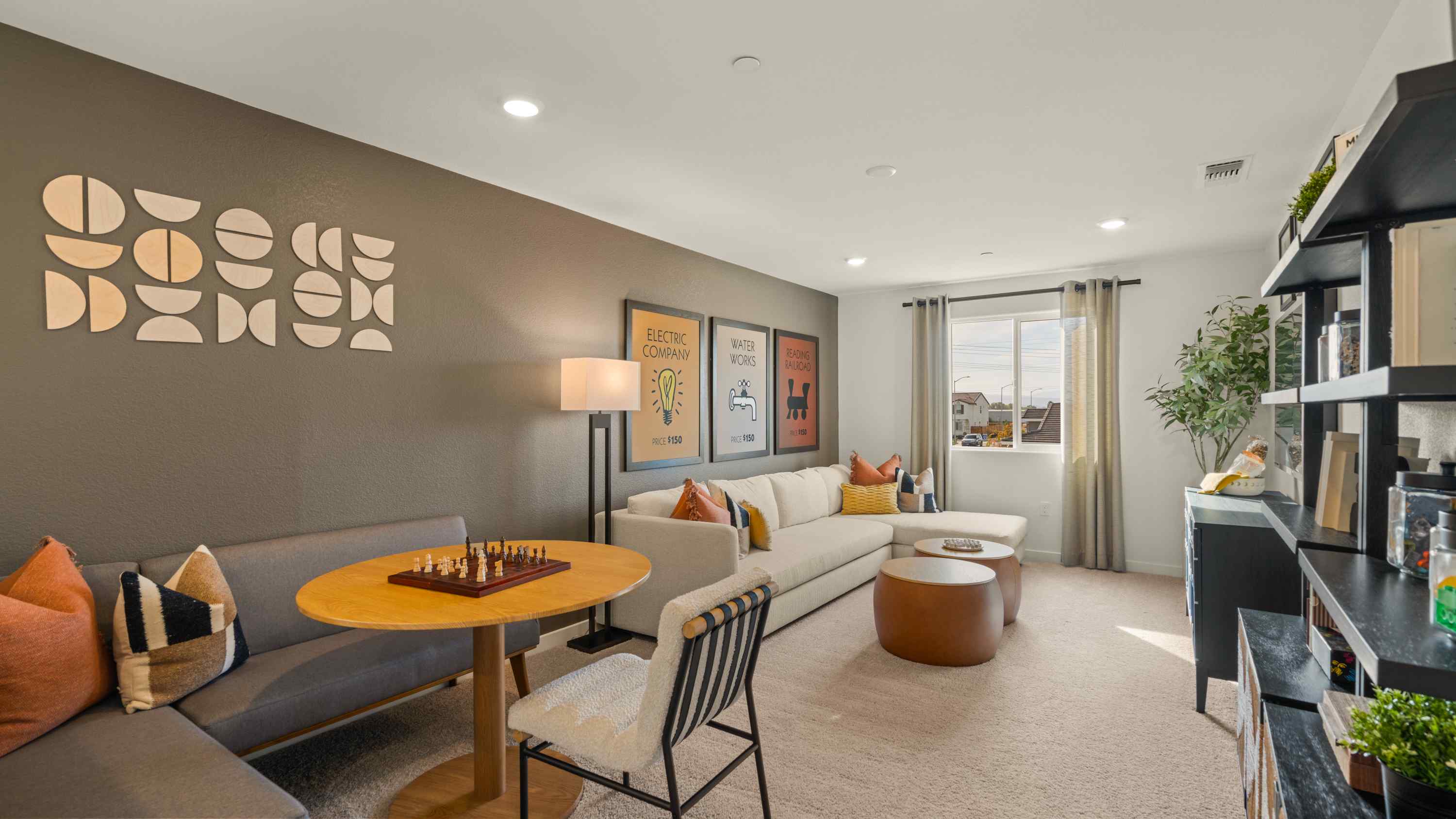 A living room with a couch and a table.