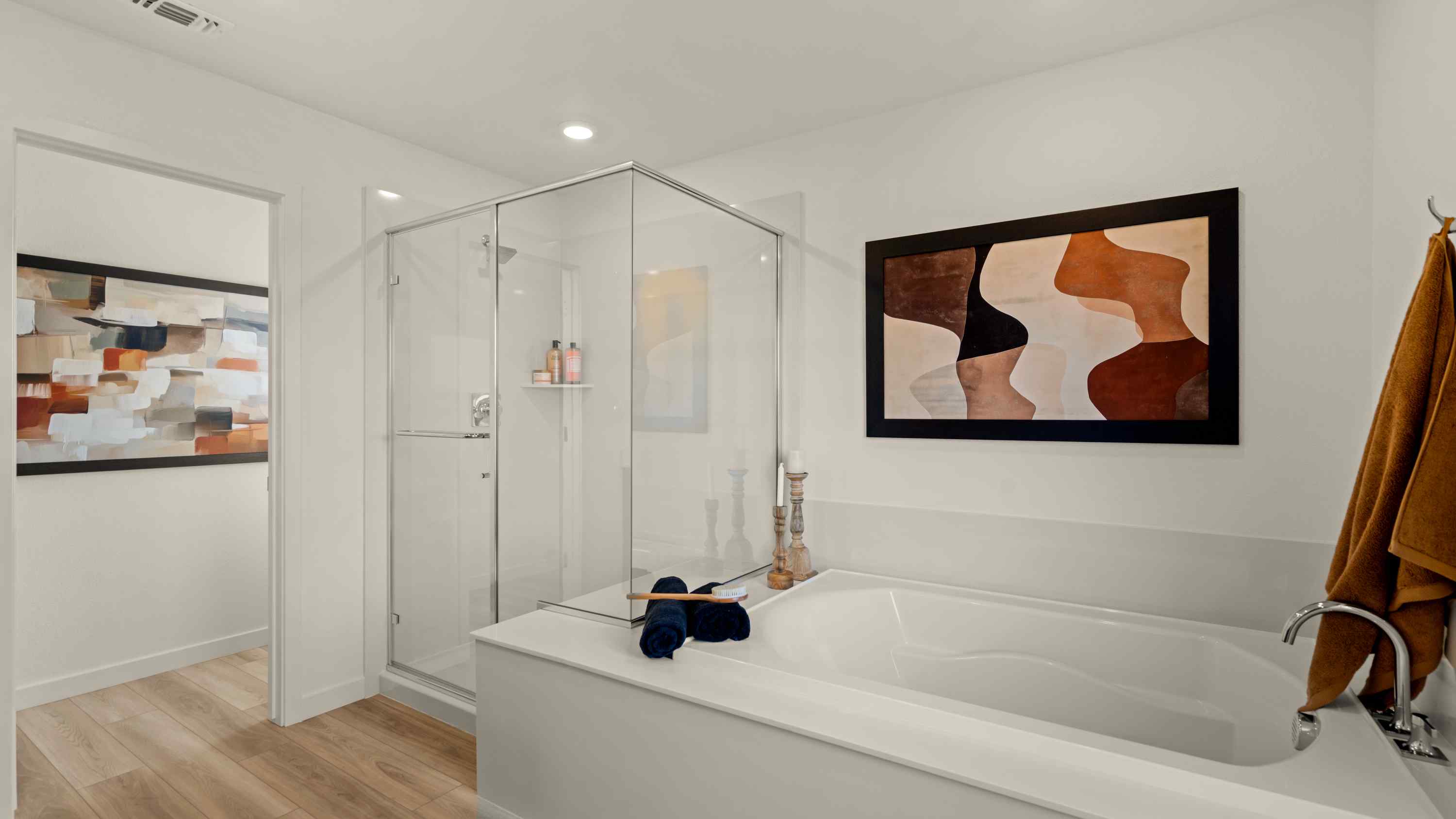 A bathroom with a large glass shower.