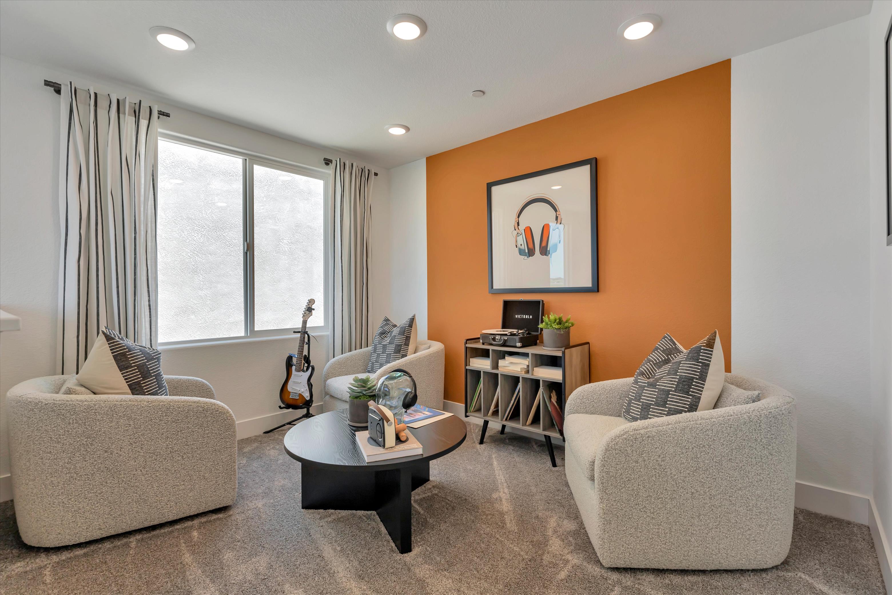 A living room with a couch and a coffee table.