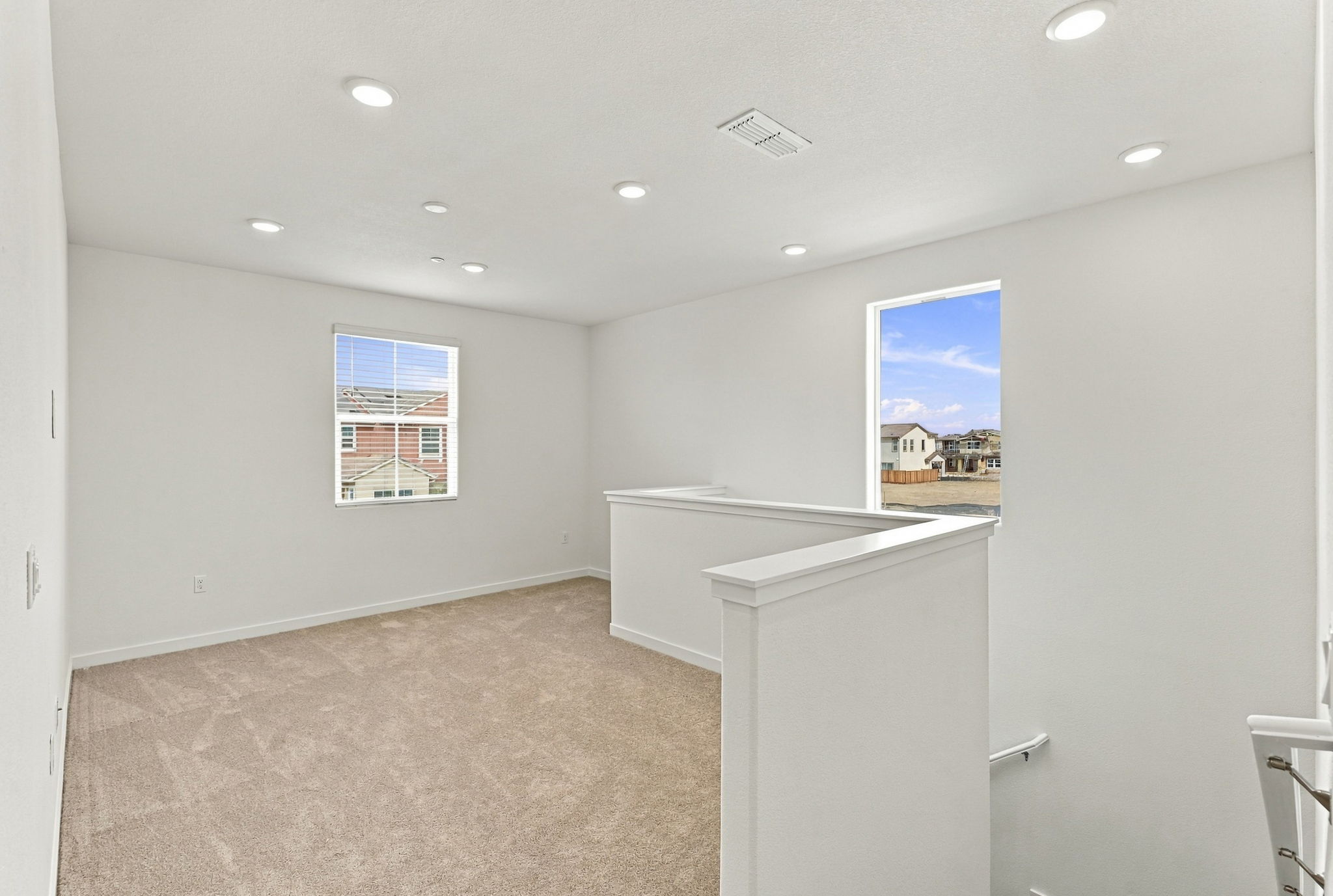 A room with a large window.