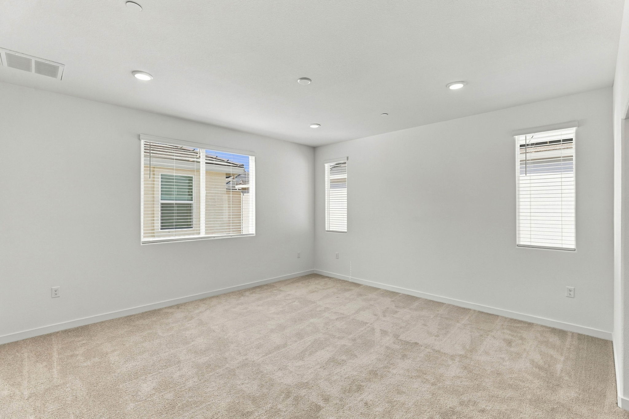 A room with a few windows.