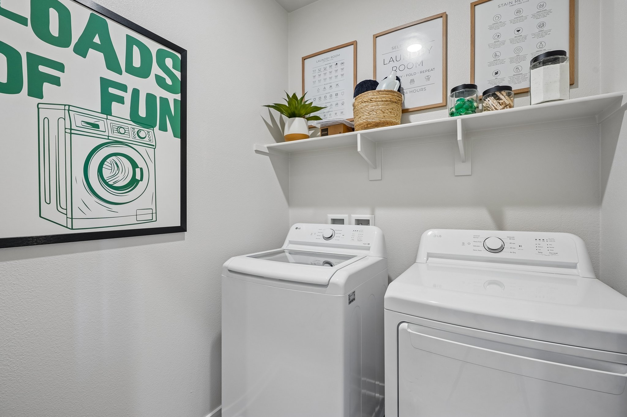 A laundry room with a washer and dryer.