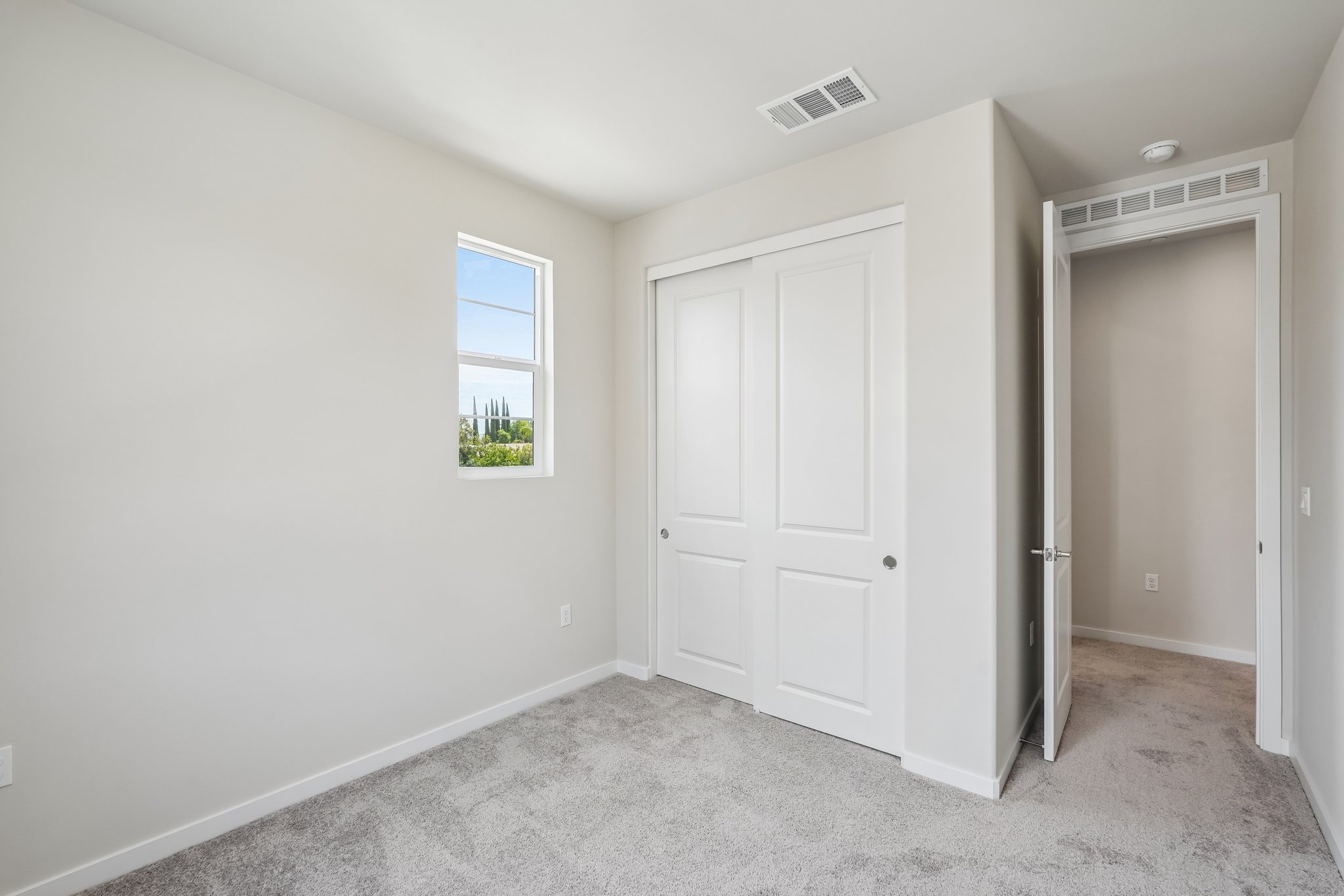 A room with white doors.