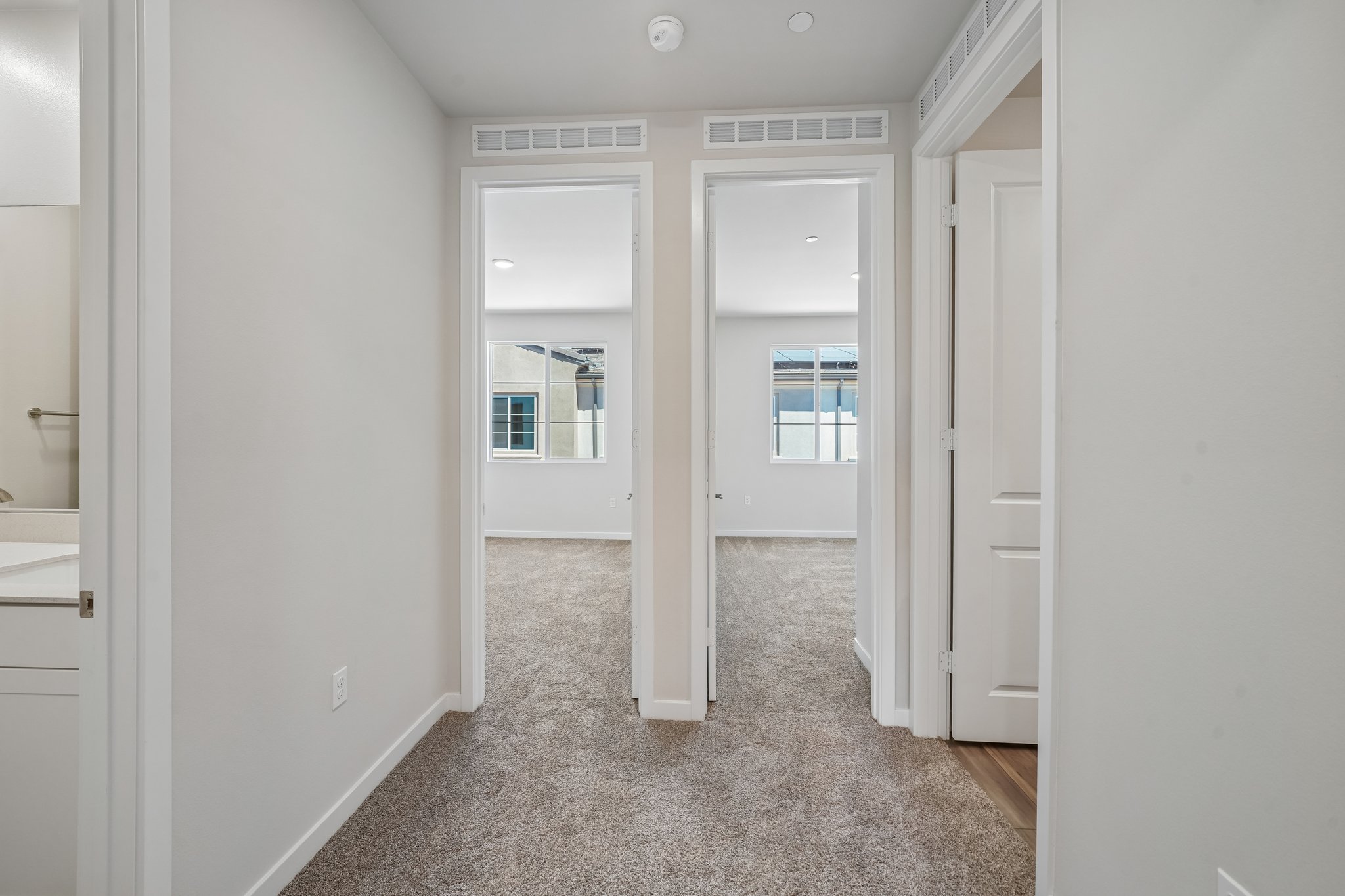 A room with white doors.