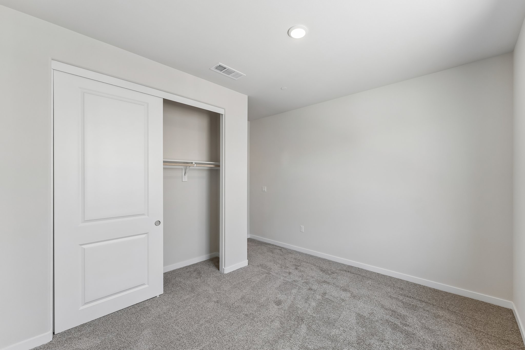 A room with white doors.