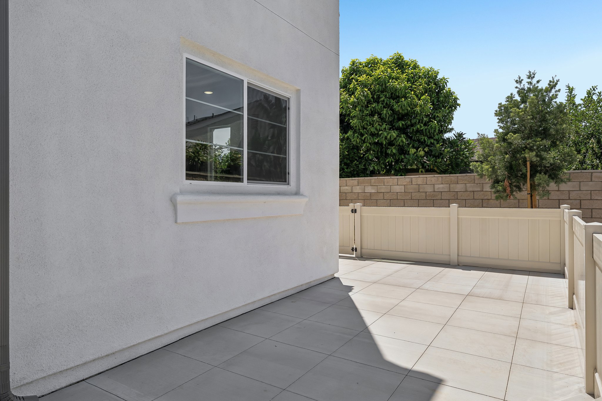 A white building with a window.