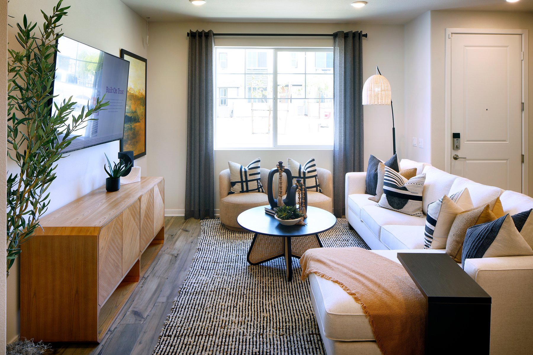 A living room with a couch and a coffee table.