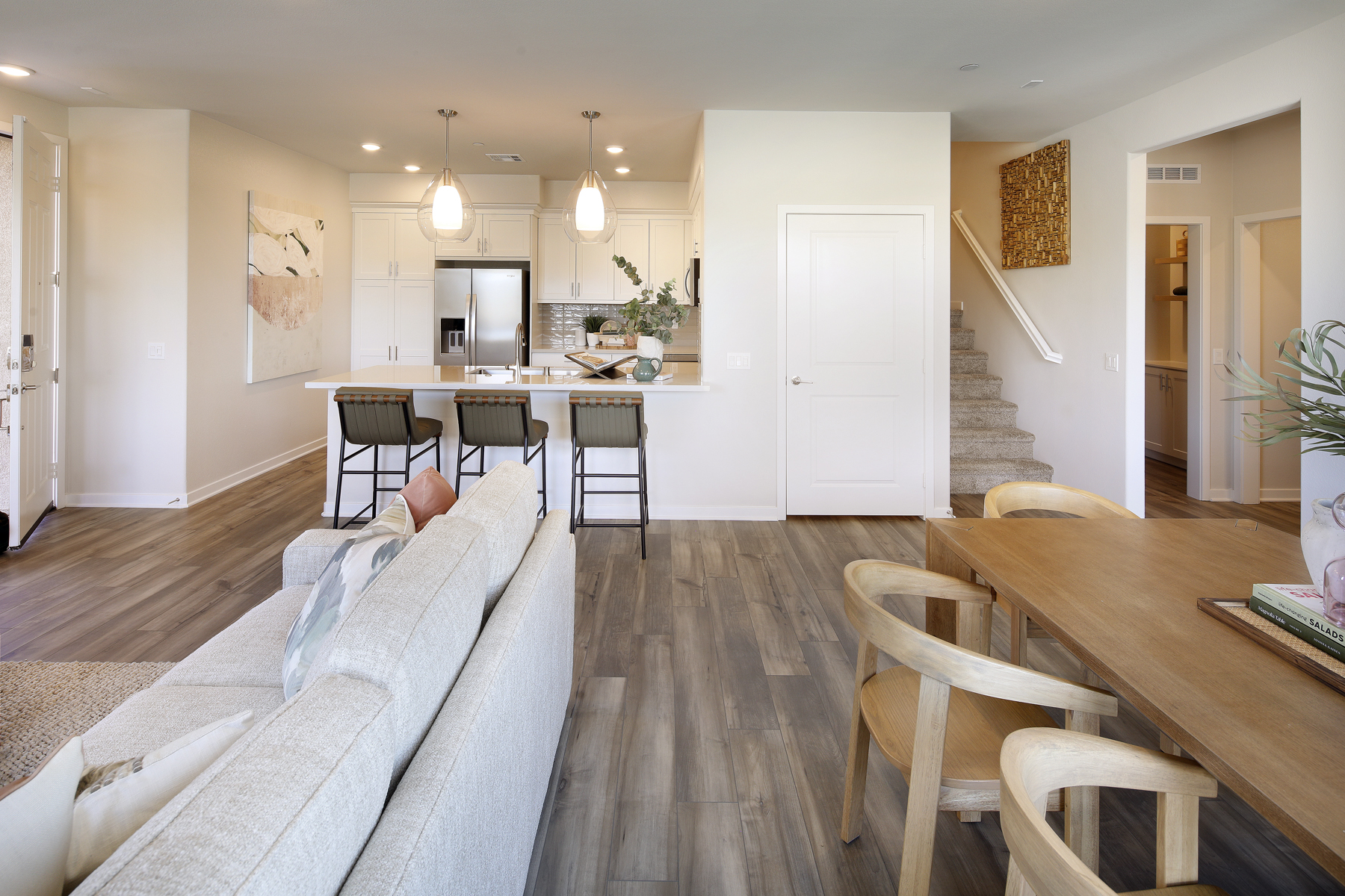A living room with a couch and a table.