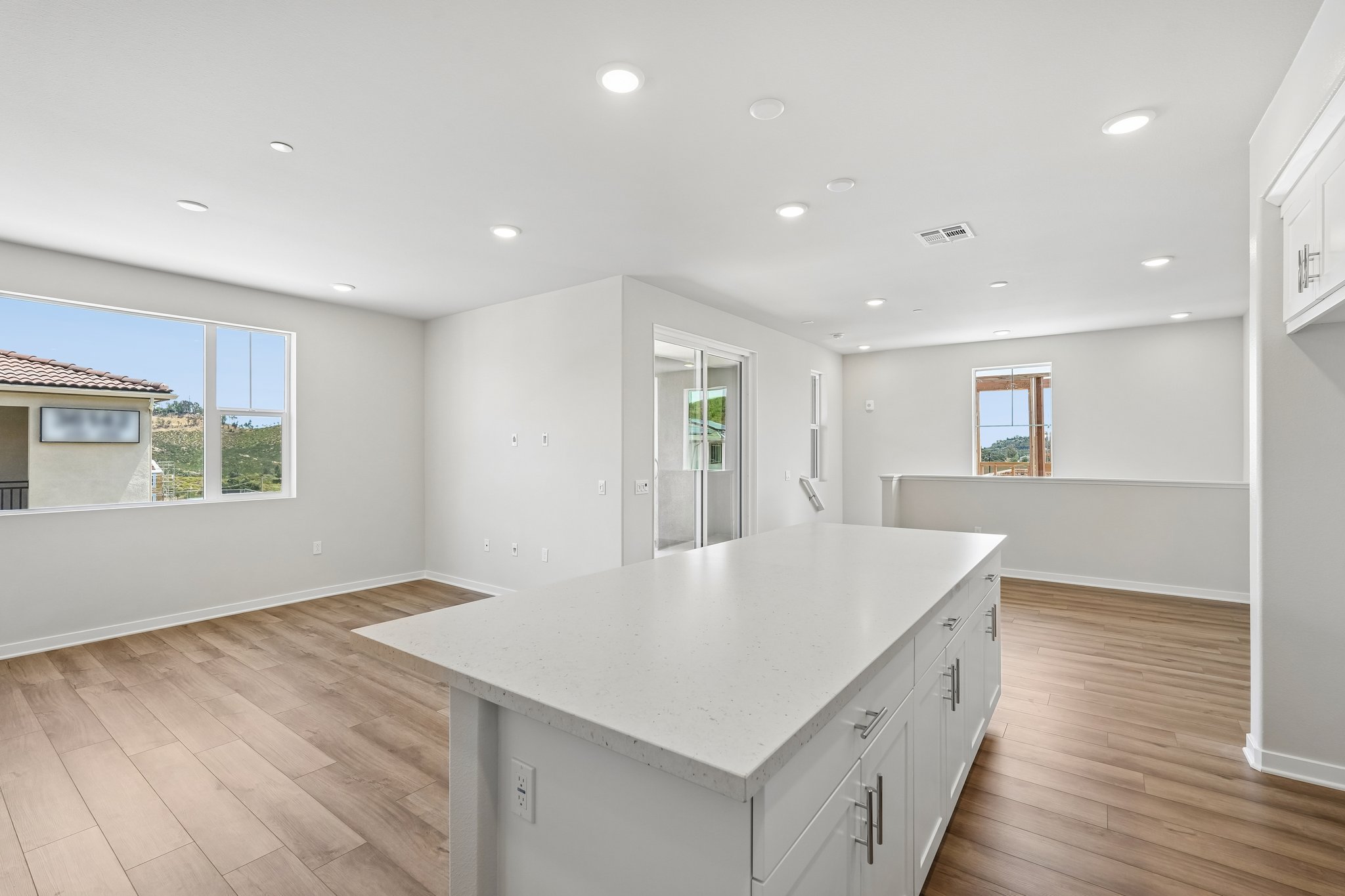 A large kitchen with a large island.