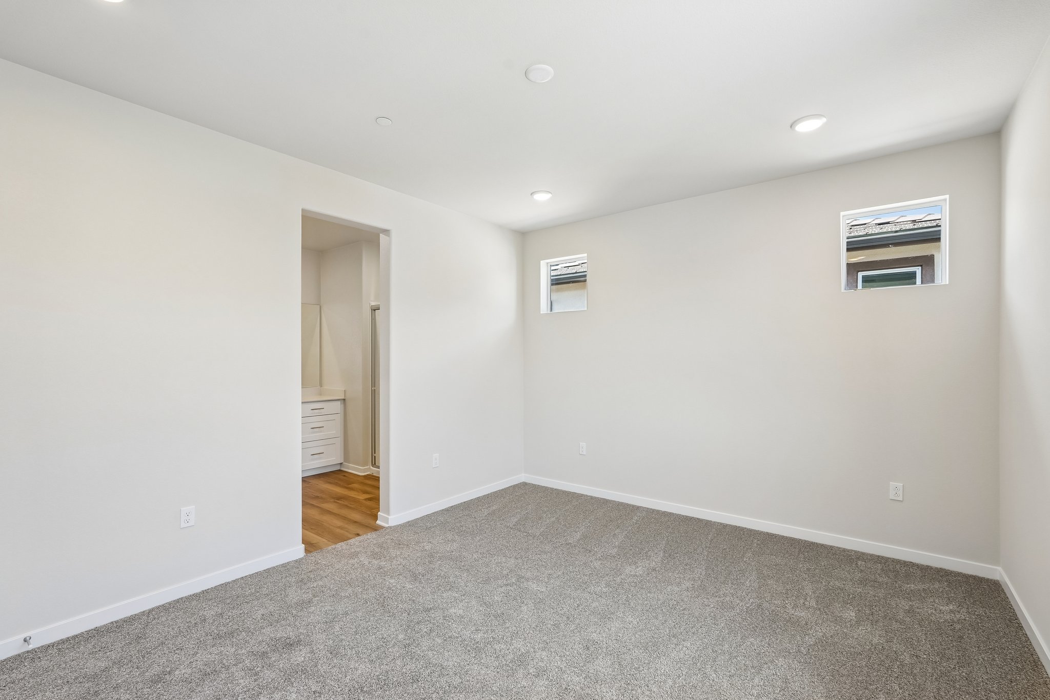 A hallway with a door.