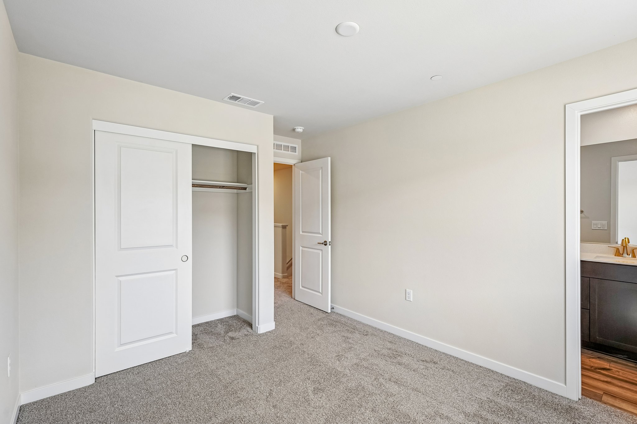A room with white doors.