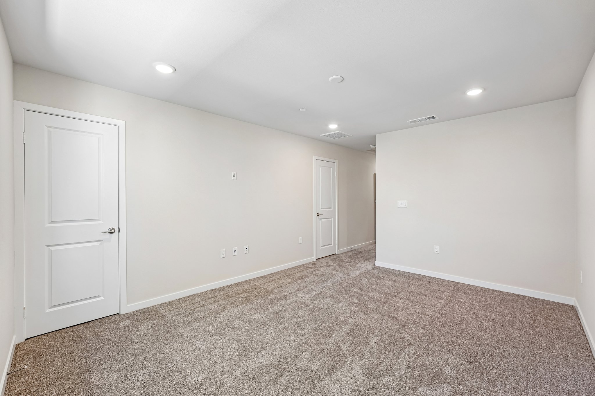 A room with white doors.