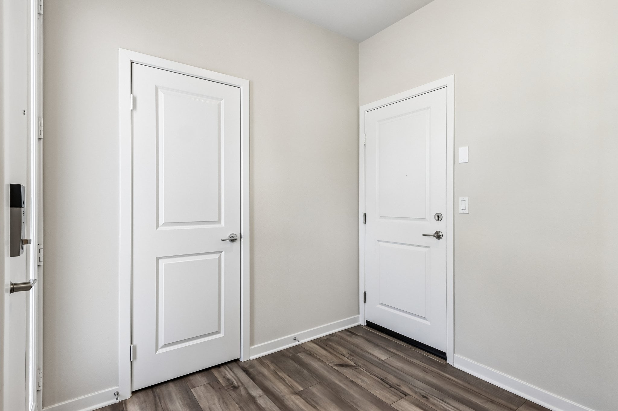 A room with white doors.