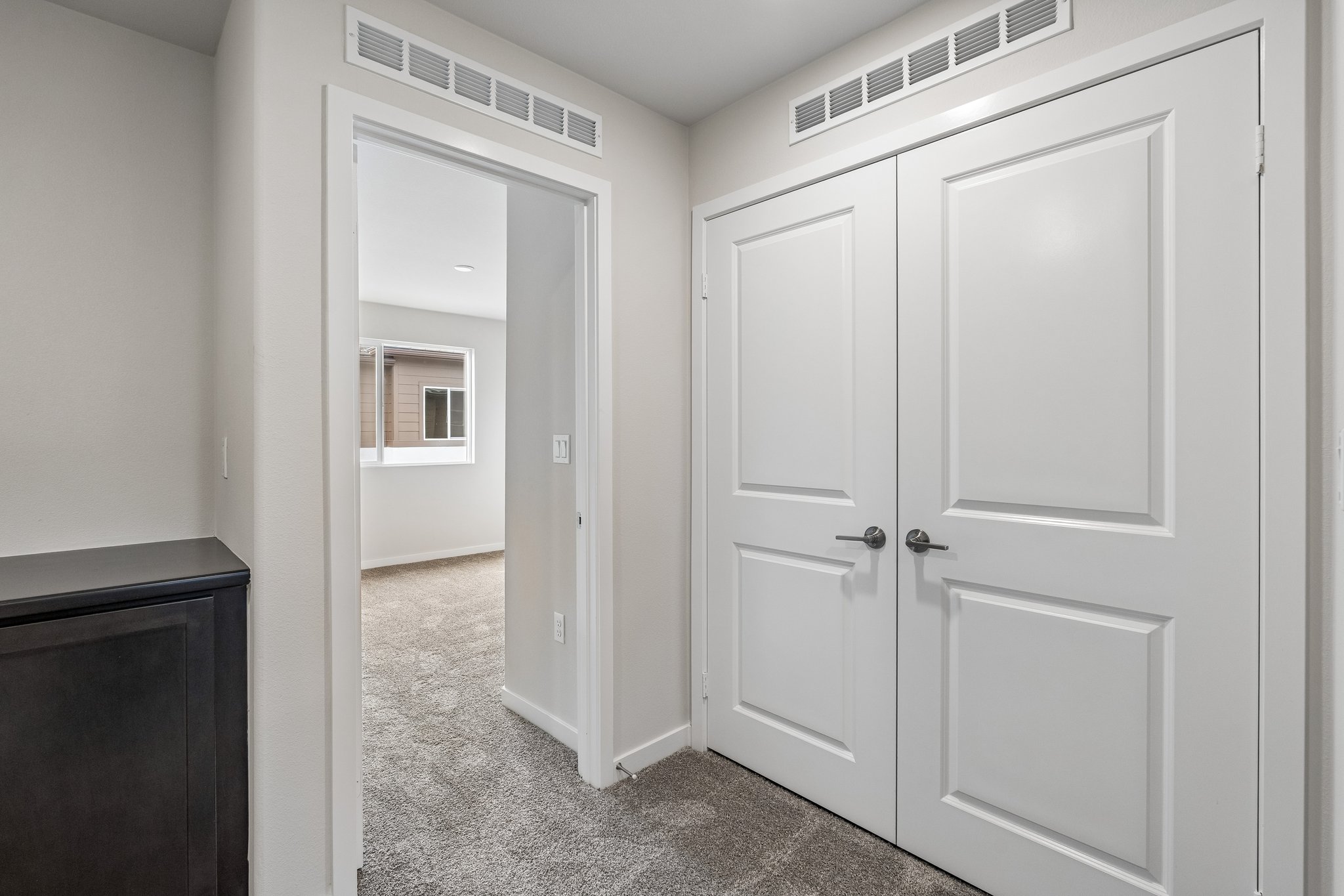 A room with white doors.
