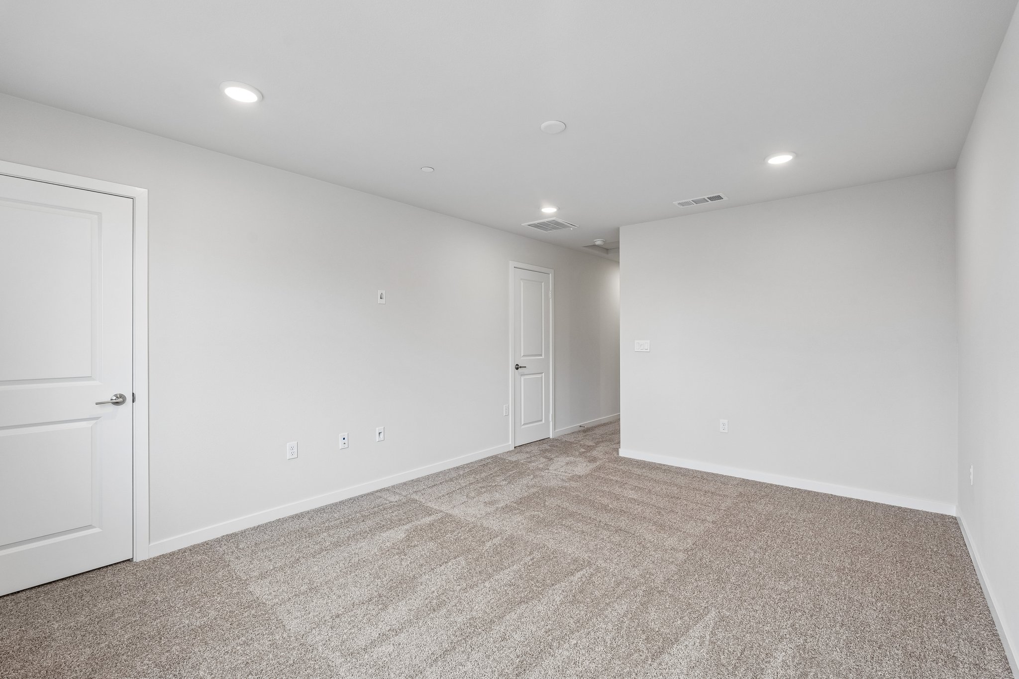 A room with white doors.