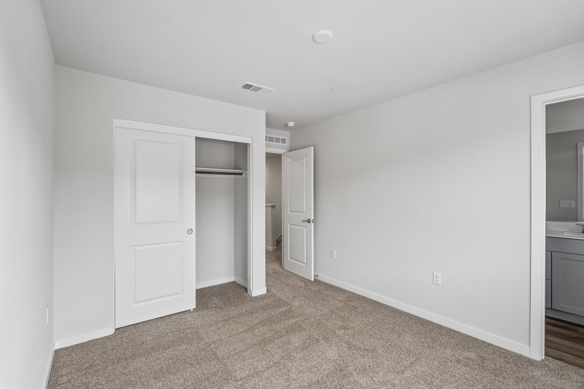A room with white doors.