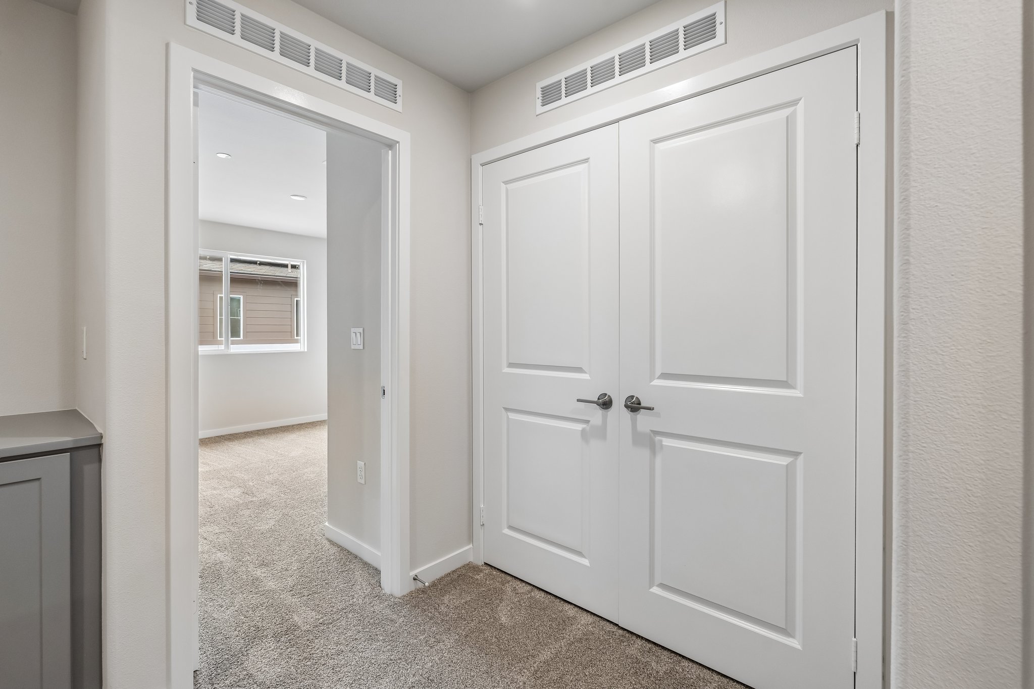 A room with white doors.