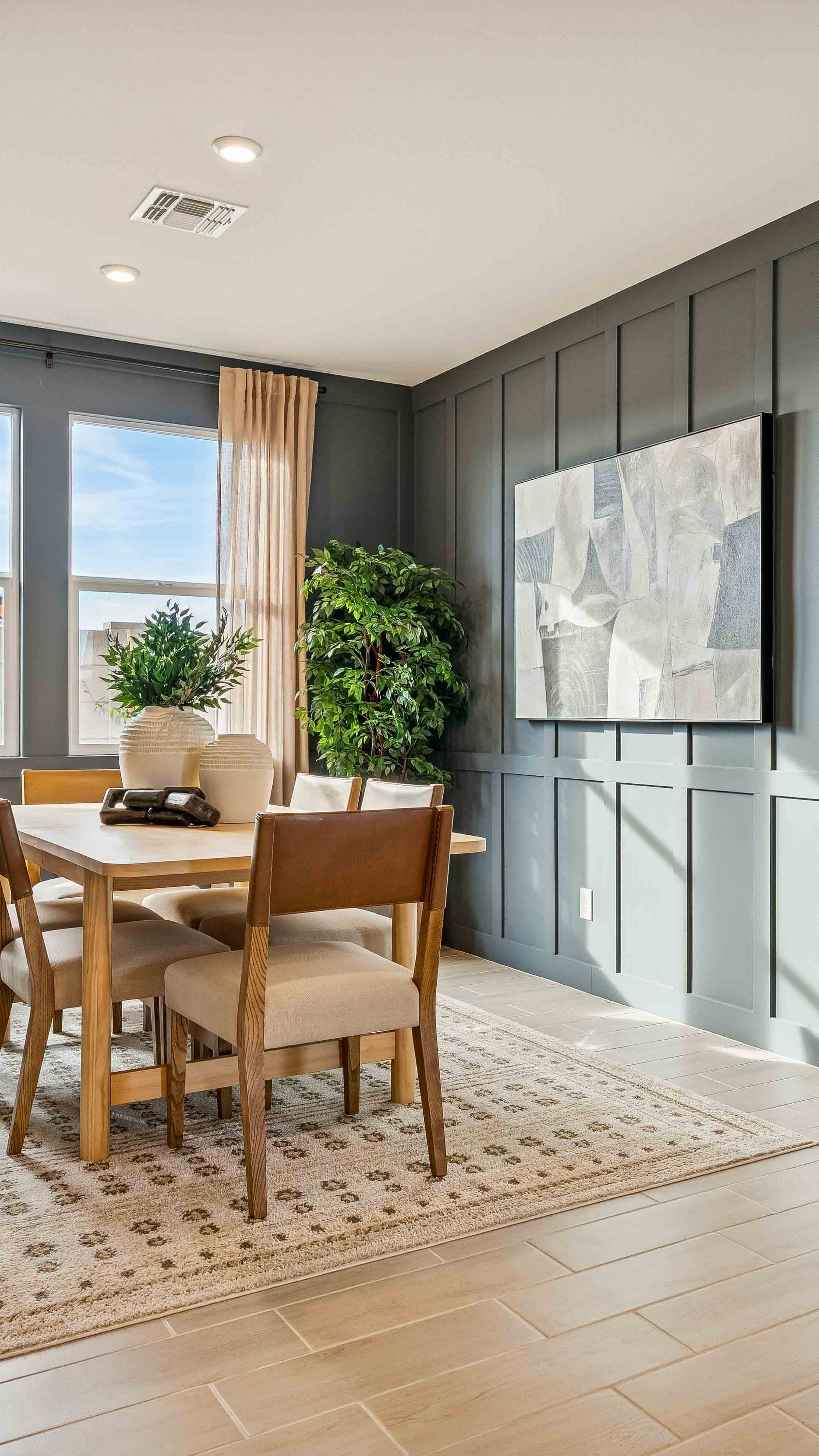 formal dining room with open concept to kitchen for quality time around the table or entertaining- New construction homes for sale Goodyear AZ Resort style amenities & founder incentives to the lucky few first homeowners.