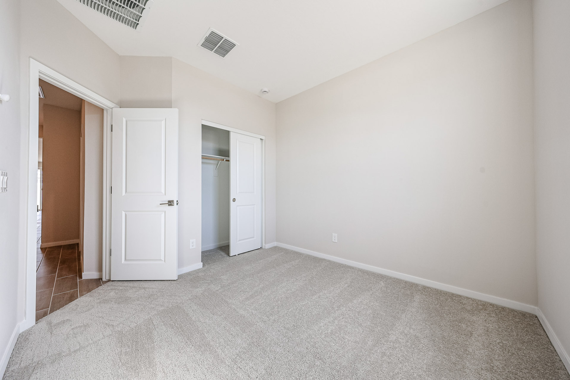 A room with white doors.