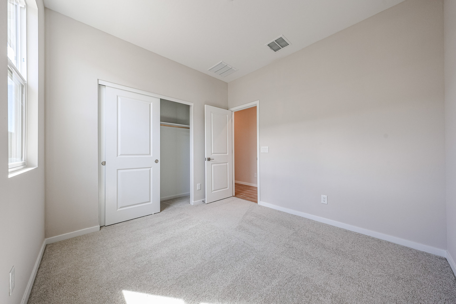 A room with white doors.
