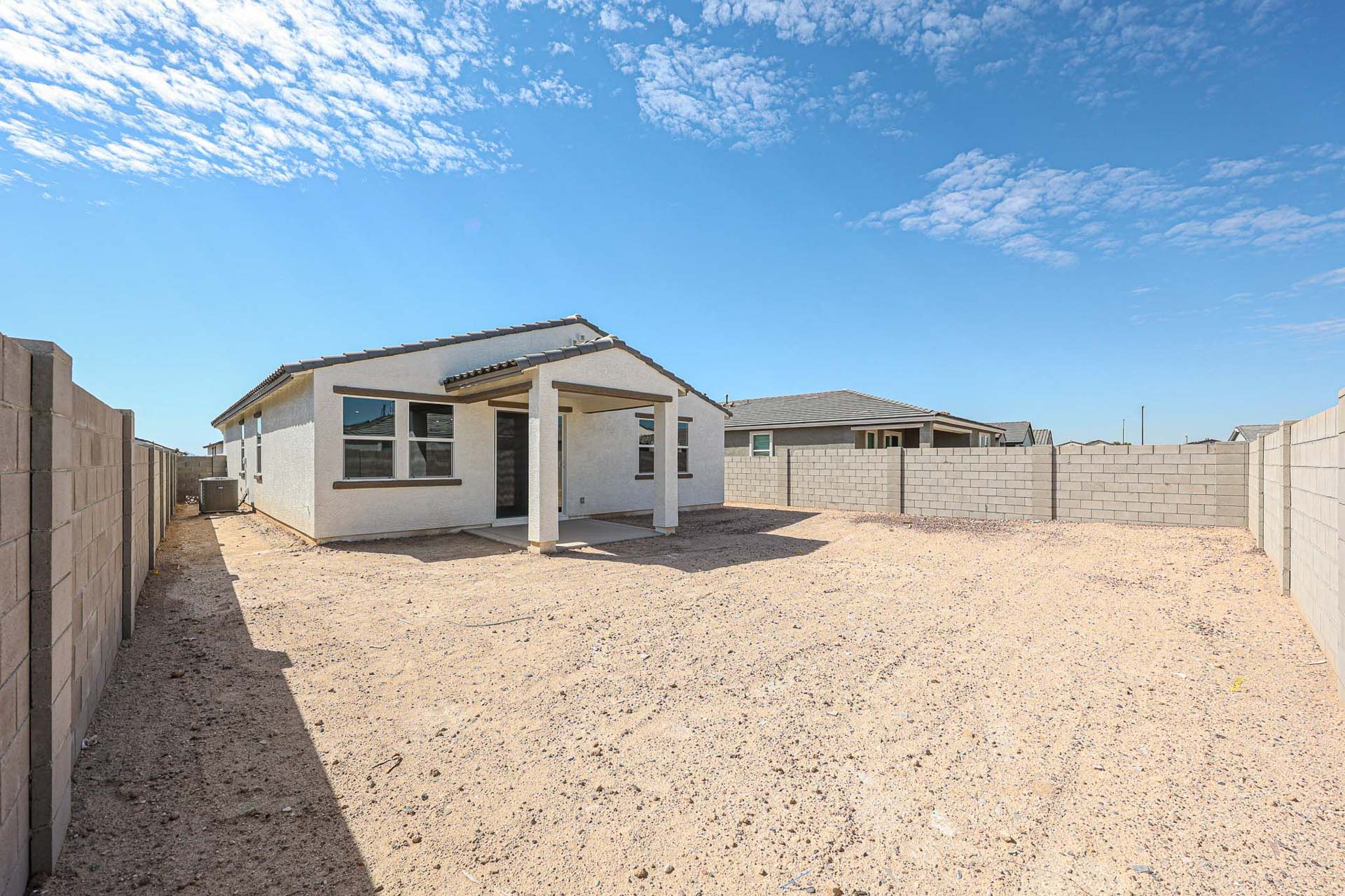 A house in a sandy area.
