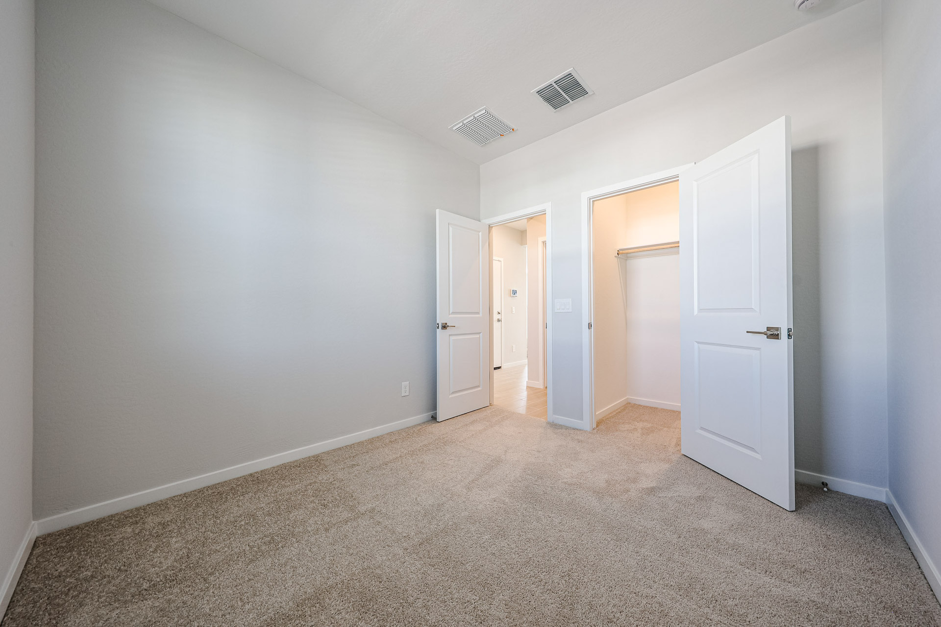 A room with white doors.